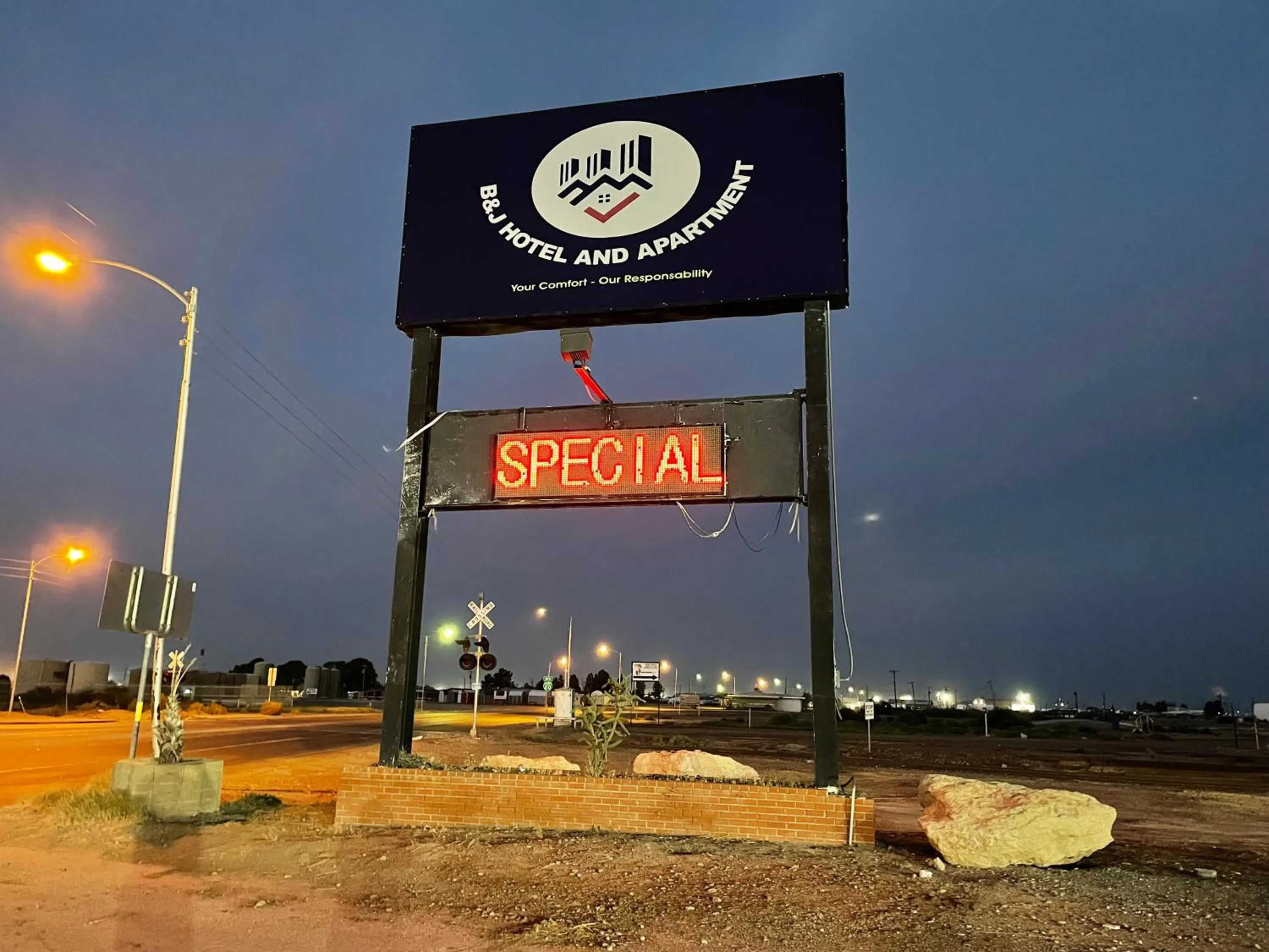 Property logo or sign in B&J HOTEL AND APARTMENTS