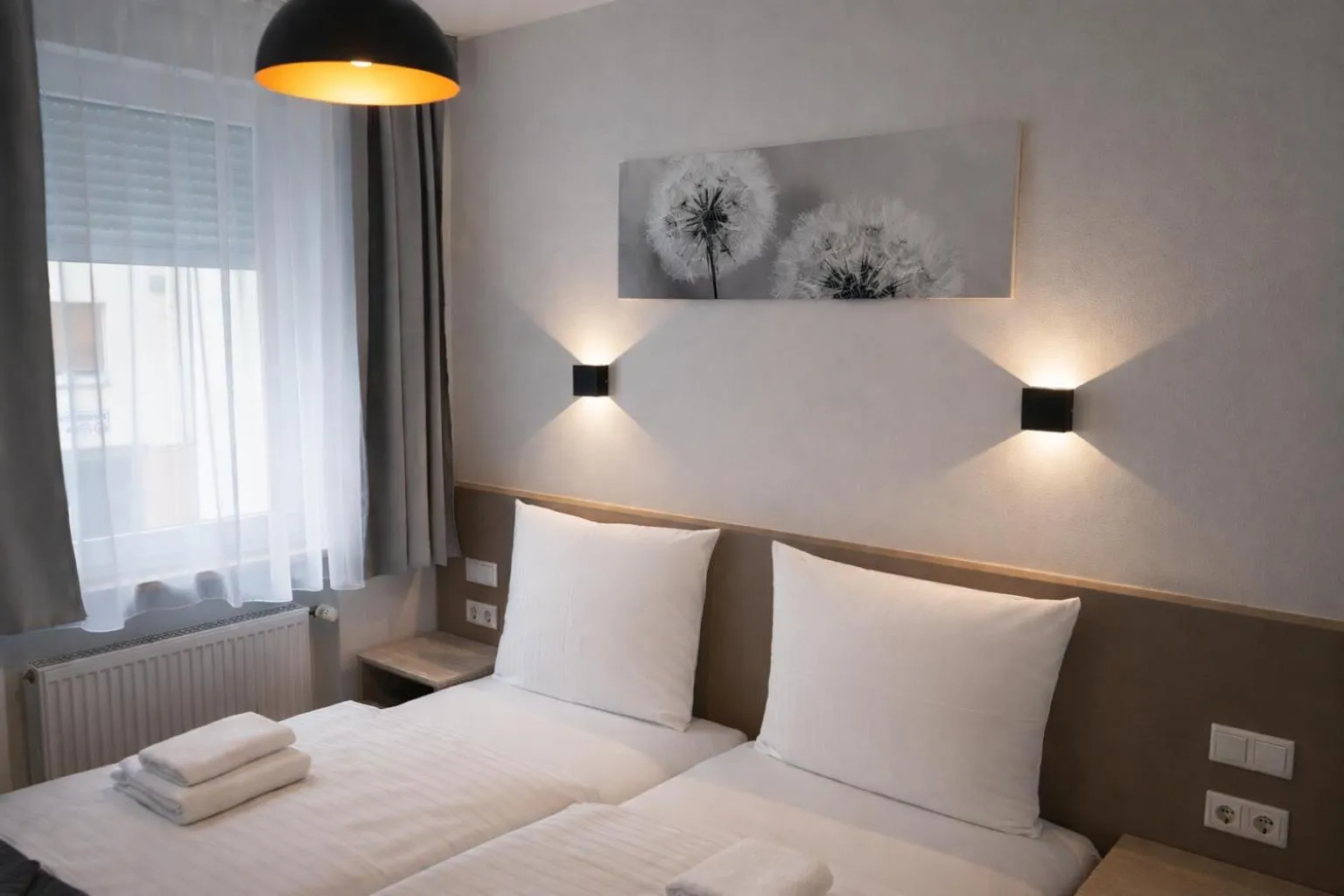 Photo of the whole room, Bed in Hotel Central City Hbf Nürnberg Garni