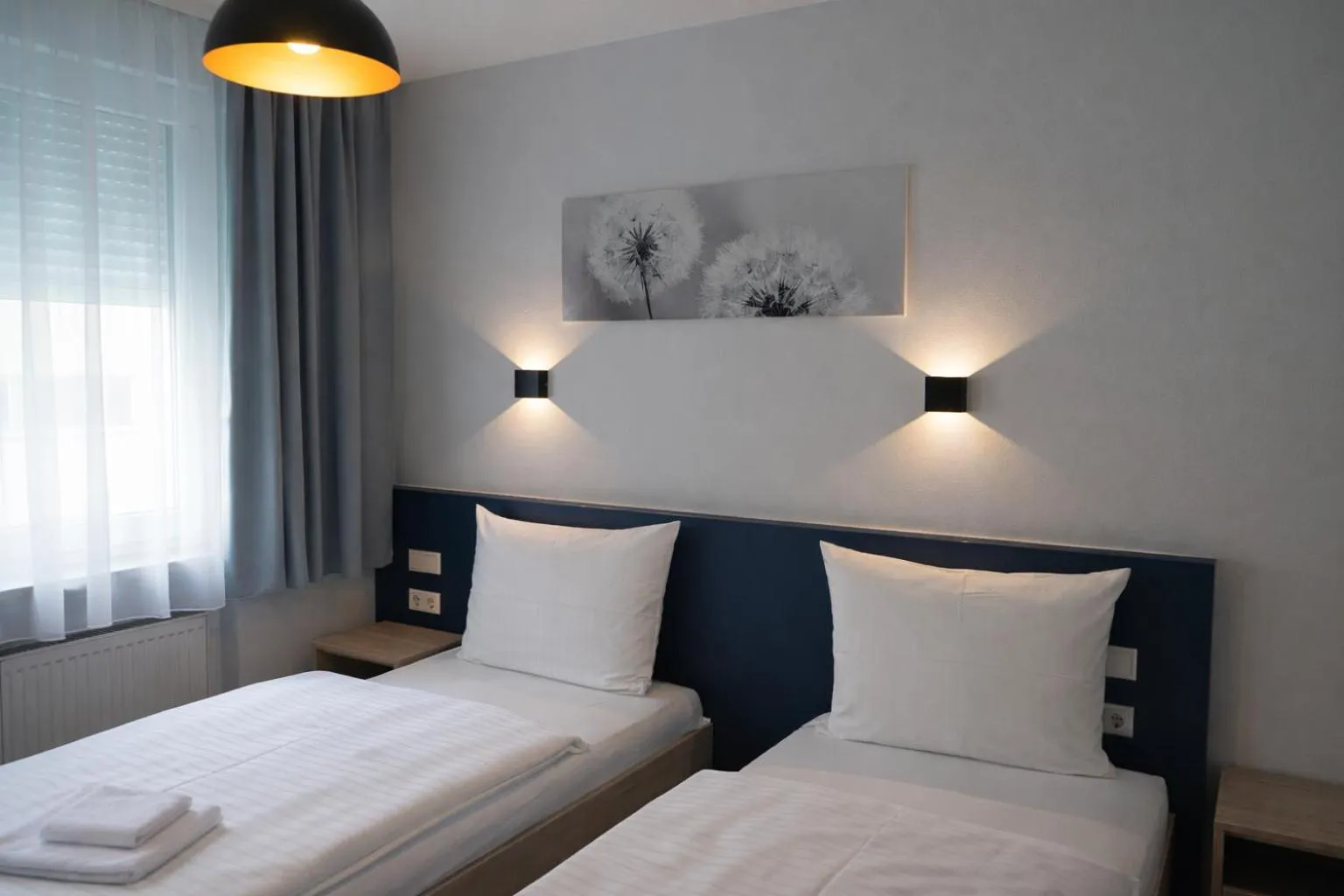 Photo of the whole room, Bed in Hotel Central City Hbf Nürnberg Garni