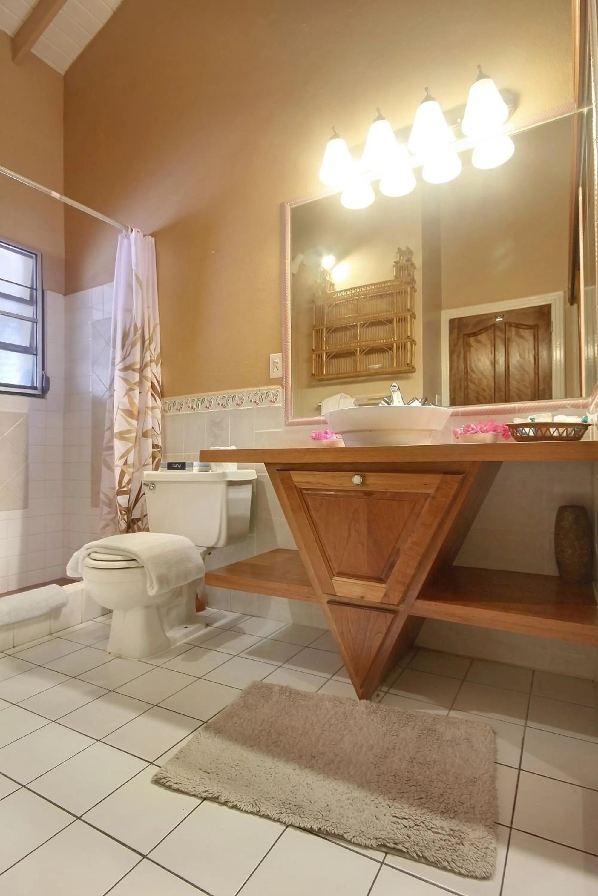 Toilet in Mary's Boon Beach Resort & Spa