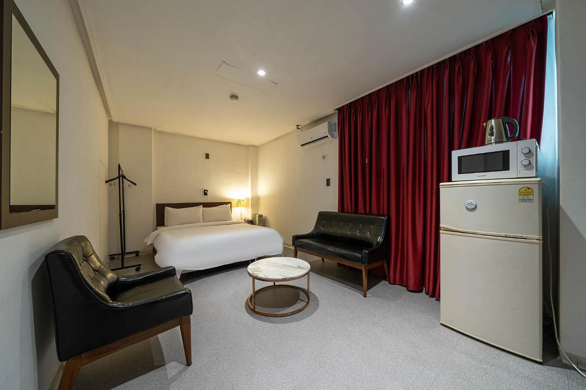 Bed in Pacific7 Hotel