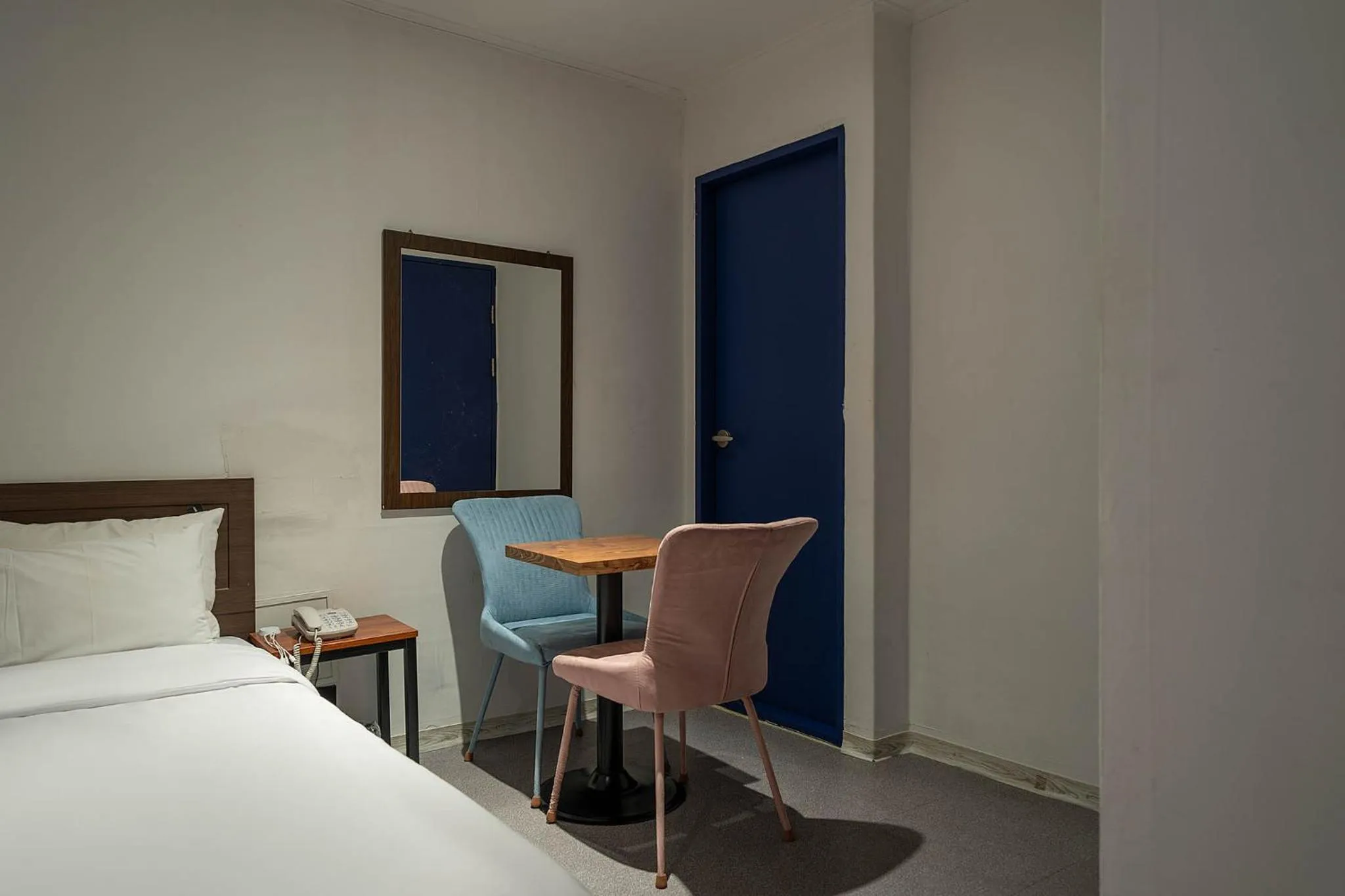 Bed in Pacific7 Hotel