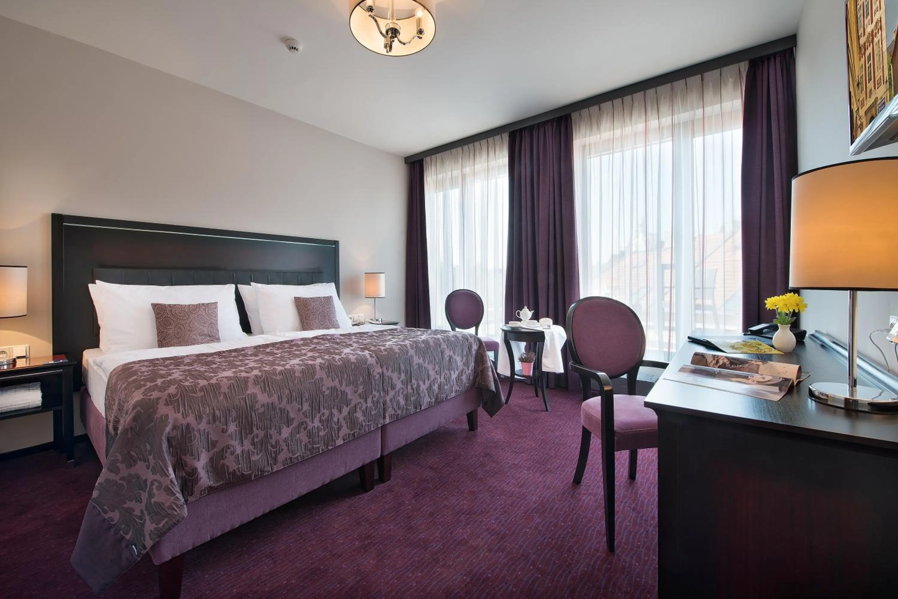 Bed in EA Embassy Prague Hotel