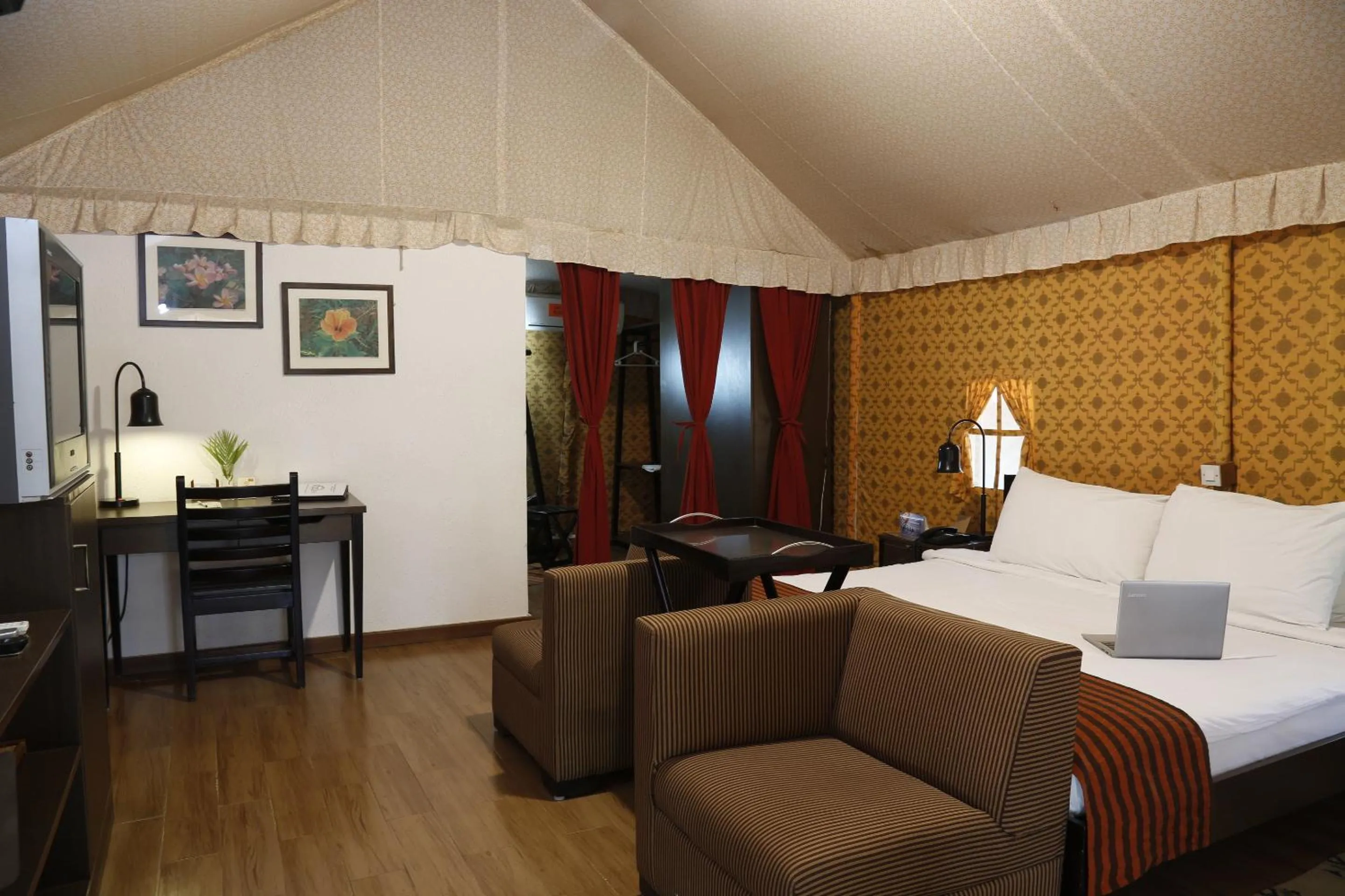 Bed in Olde Bangalore Resort and Wellness Center