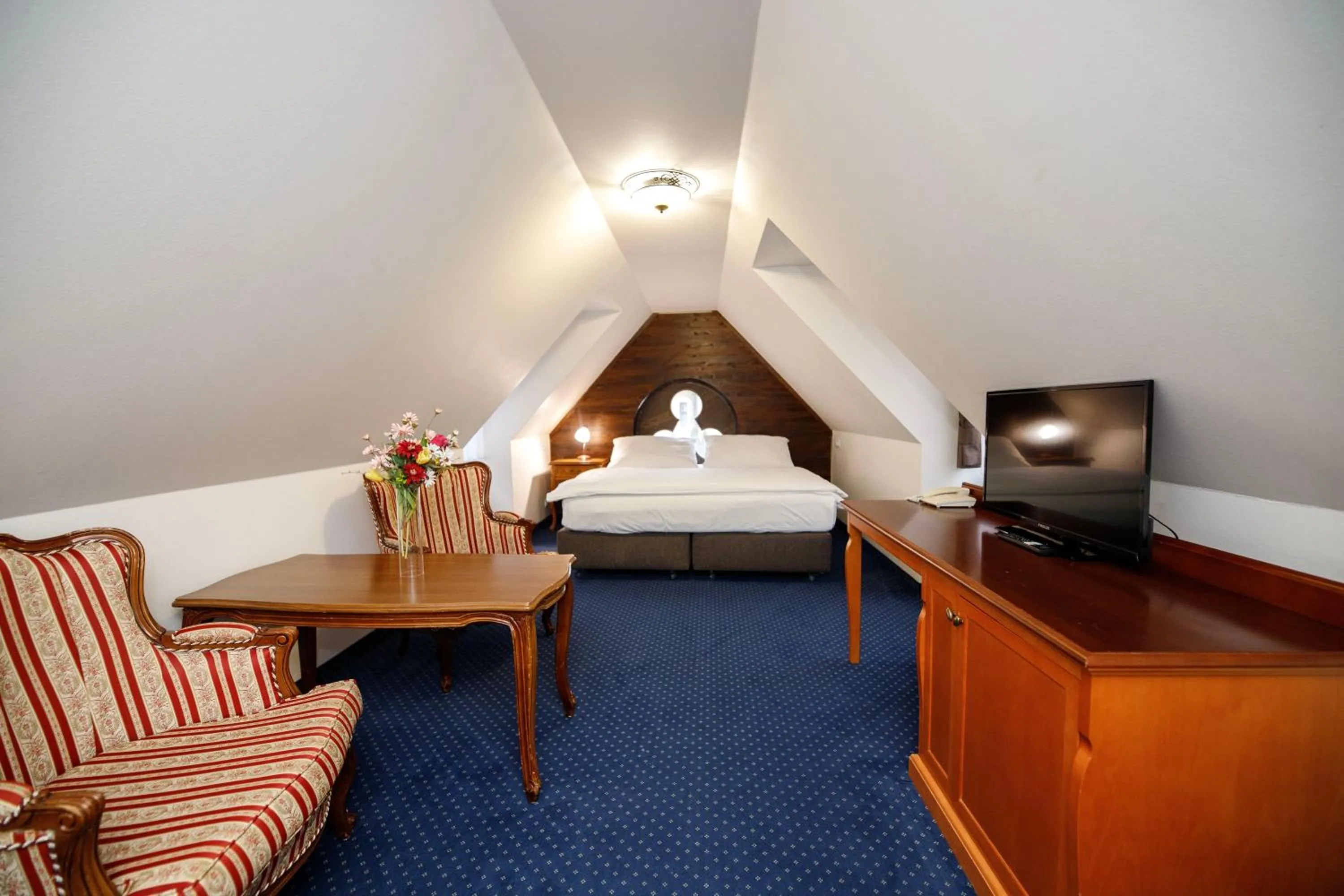 Living room, Bed in Hotel Štekl