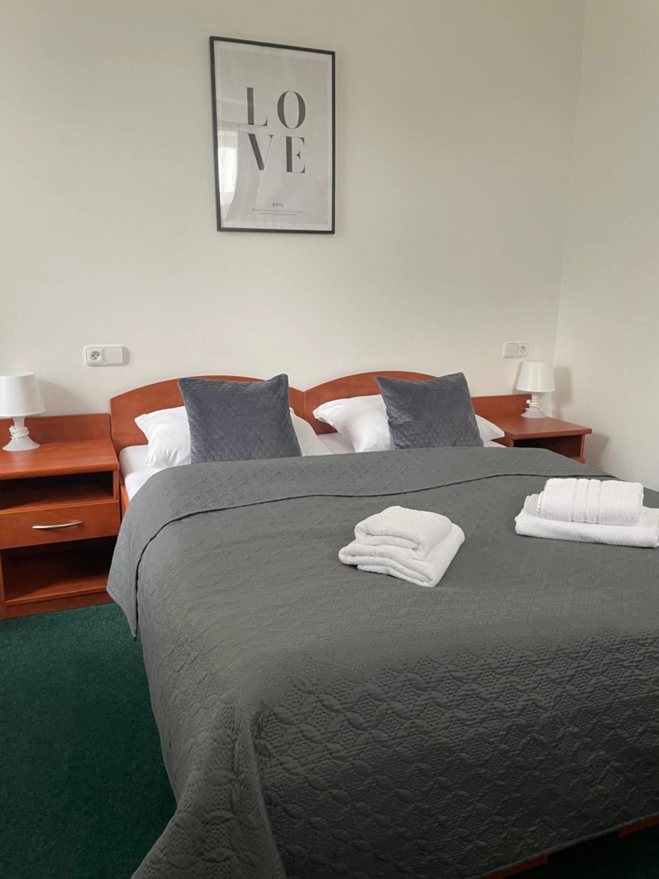 Bed in Hotel Karolina