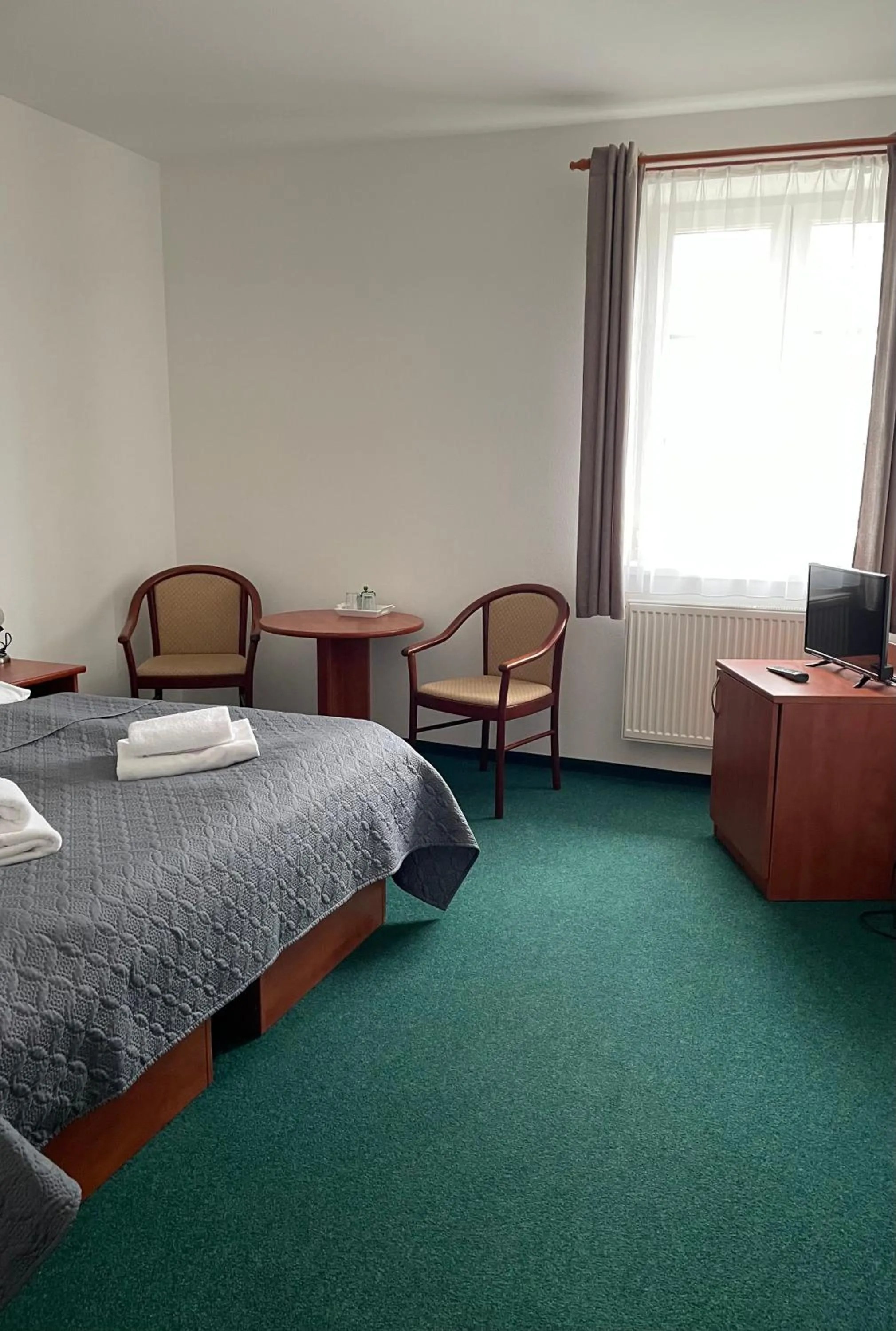 Bed in Hotel Karolina