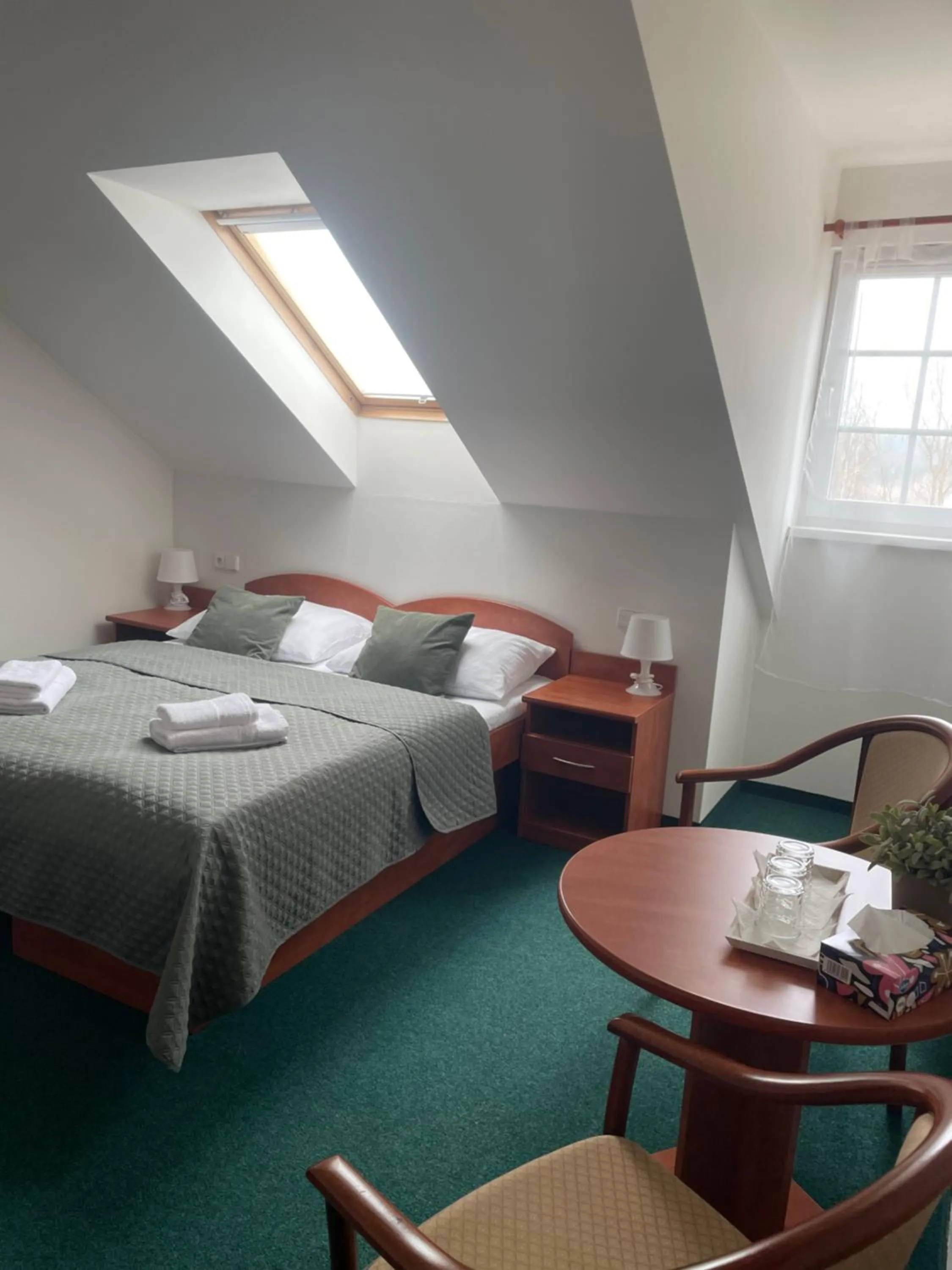 Bed in Hotel Karolina