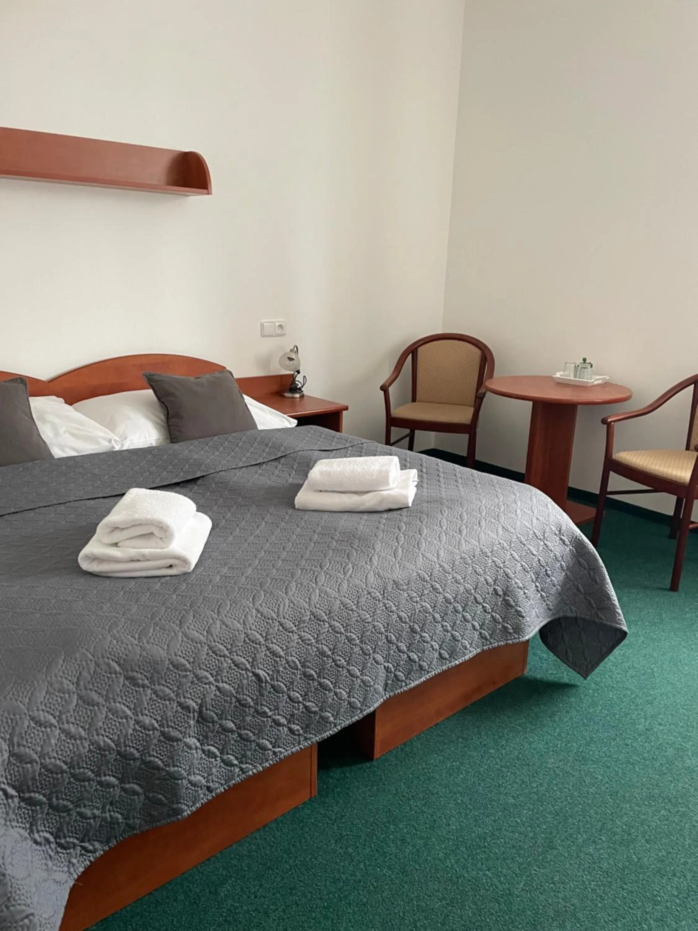 Bed in Hotel Karolina