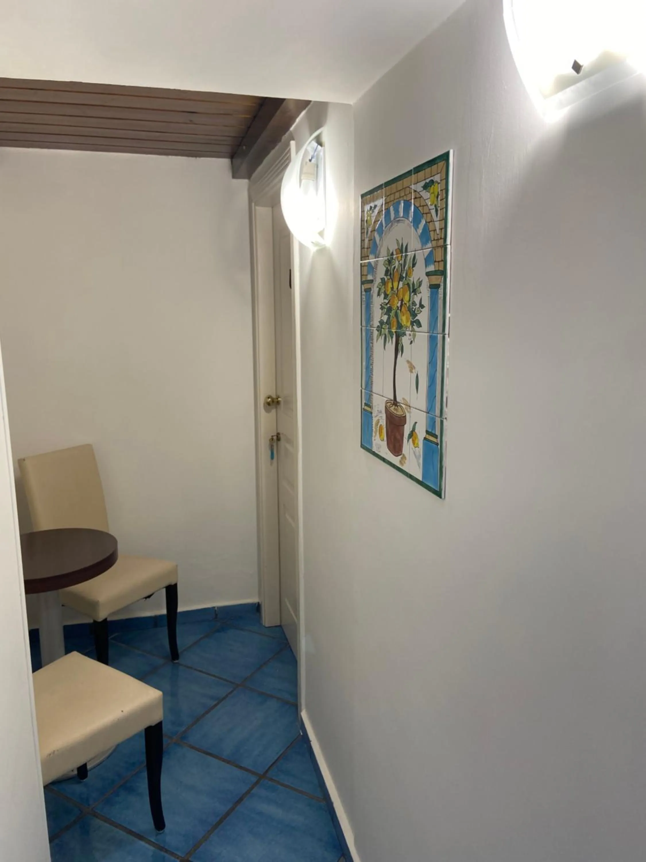 Communal lounge/ TV room in B&B Riviera