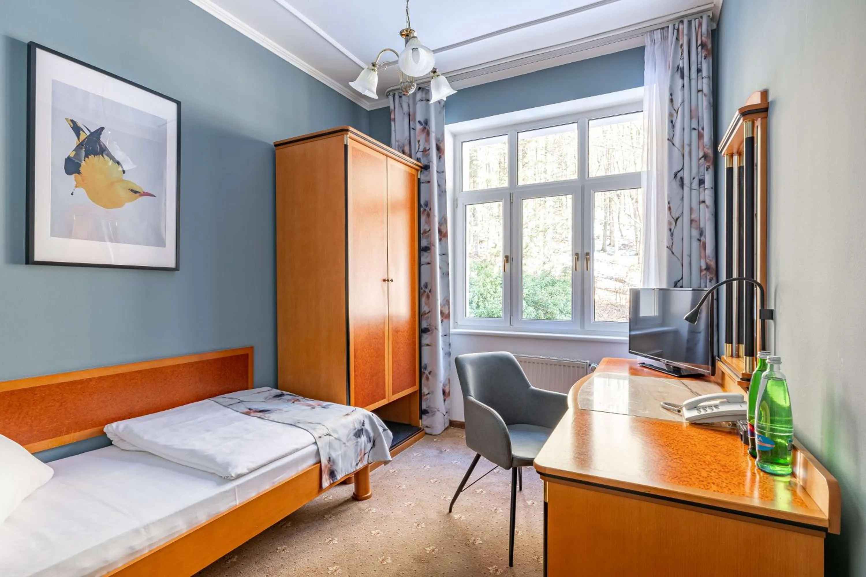 wardrobe, Bed in Spa & Wellness Hotel Silva