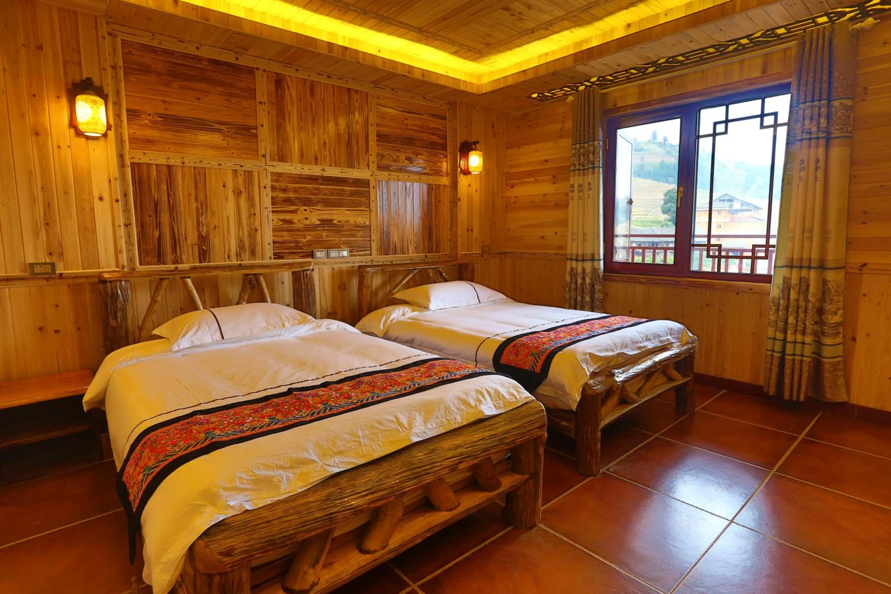 Photo of the whole room, Bed in Longji Holiday Hotel