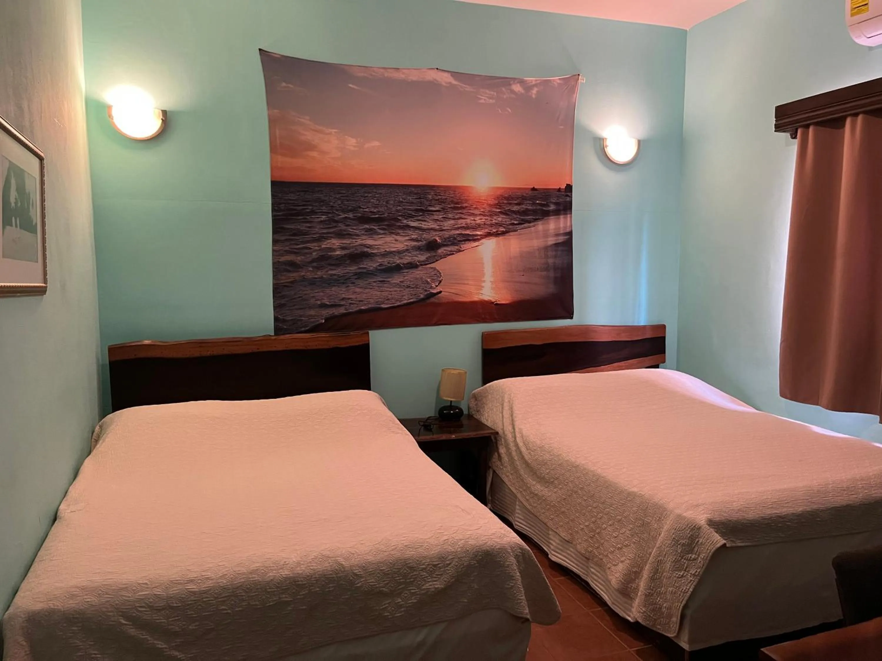 Bed in Easy Inn Hotel