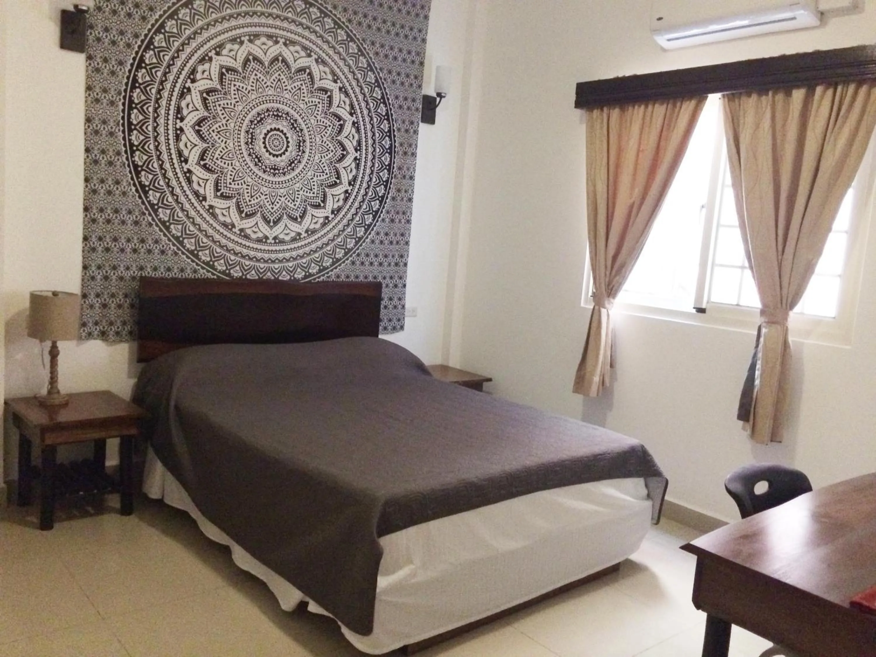 Bed in Easy Inn Hotel