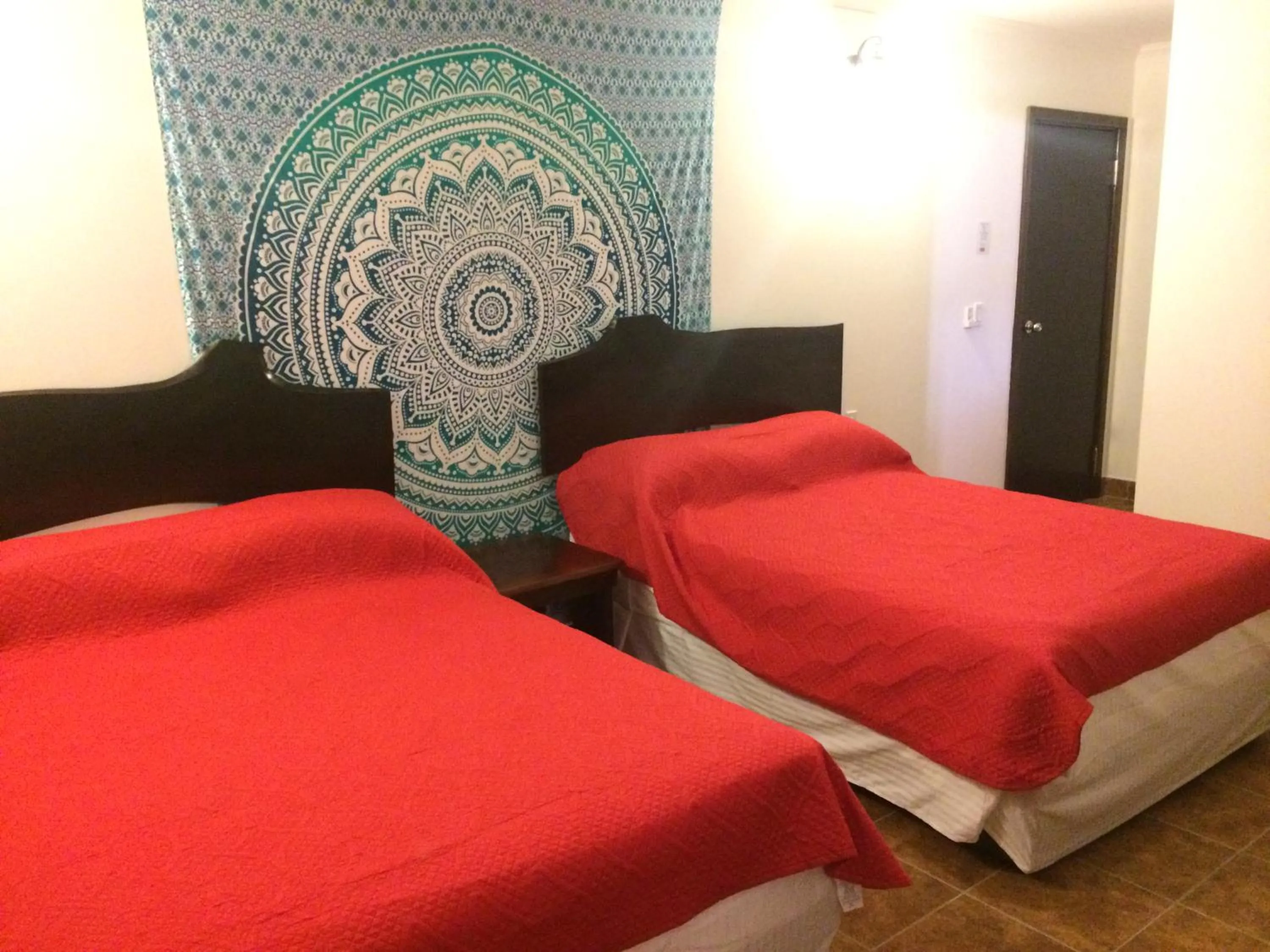 Bed in Easy Inn Hotel