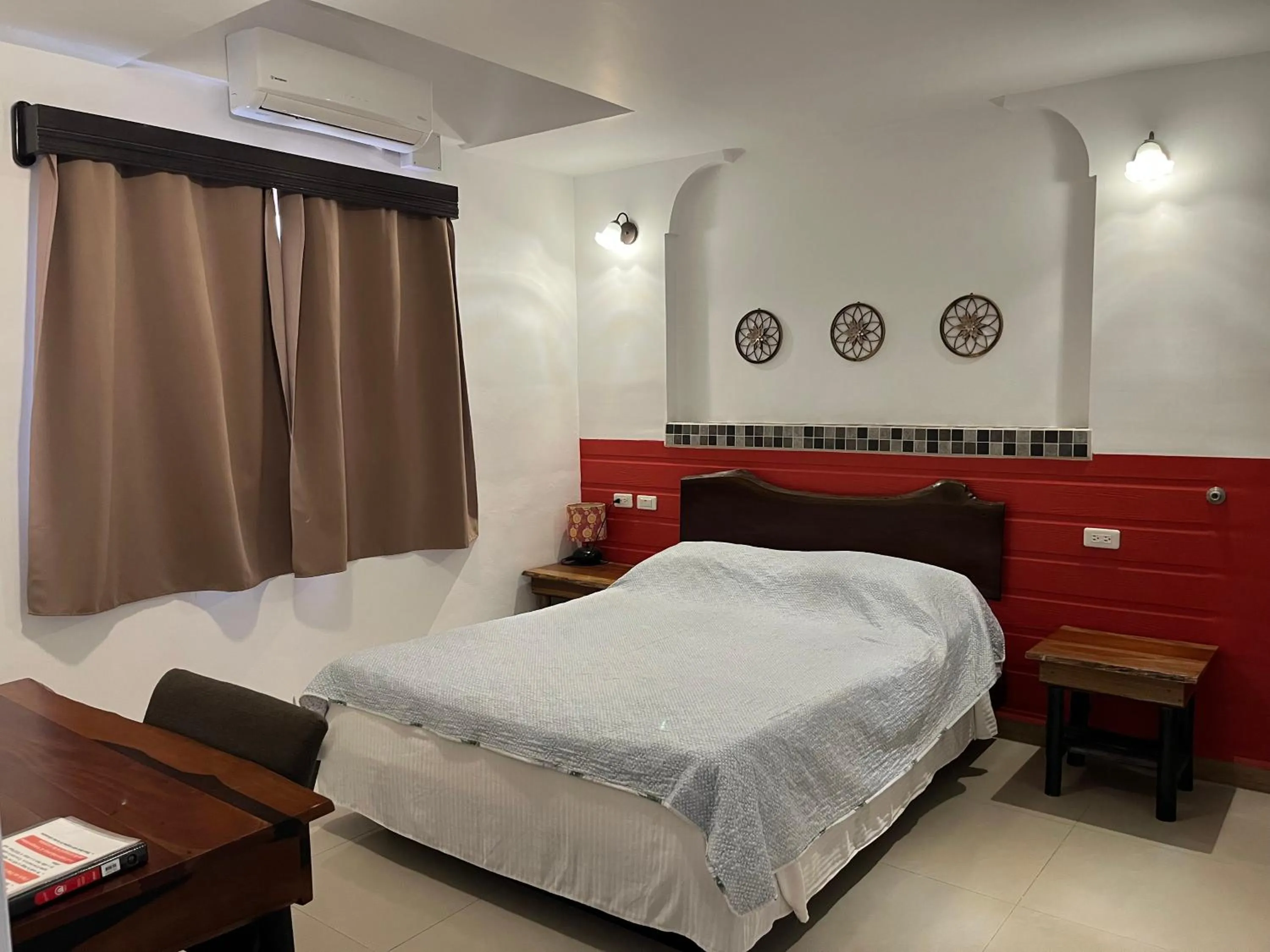 Bed in Easy Inn Hotel