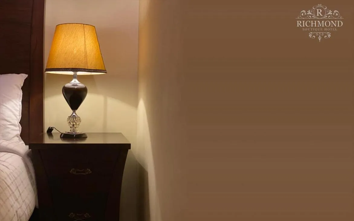 Living room, Bed in Richmond Boutique Hotel