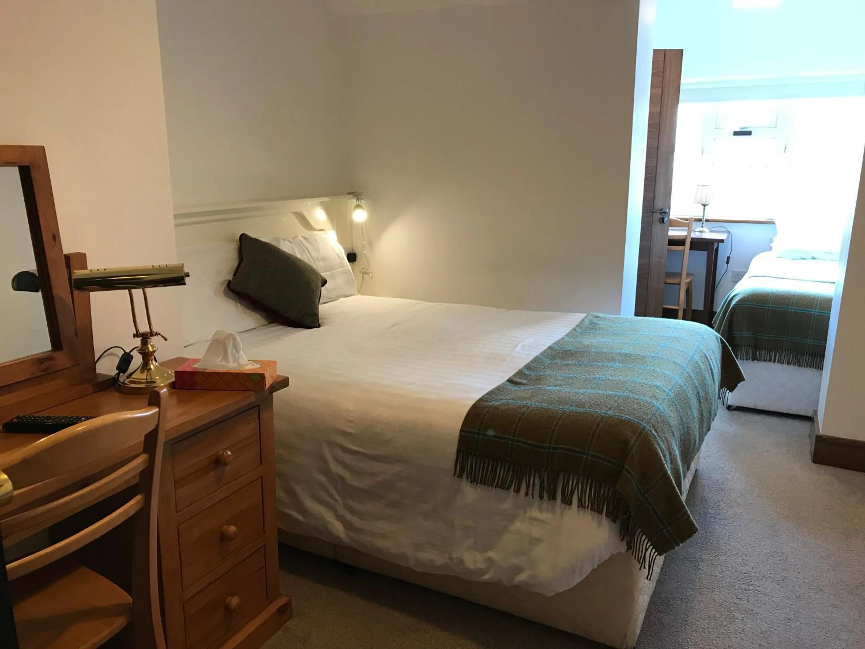 Bed in Ryan's River Lodge B&B