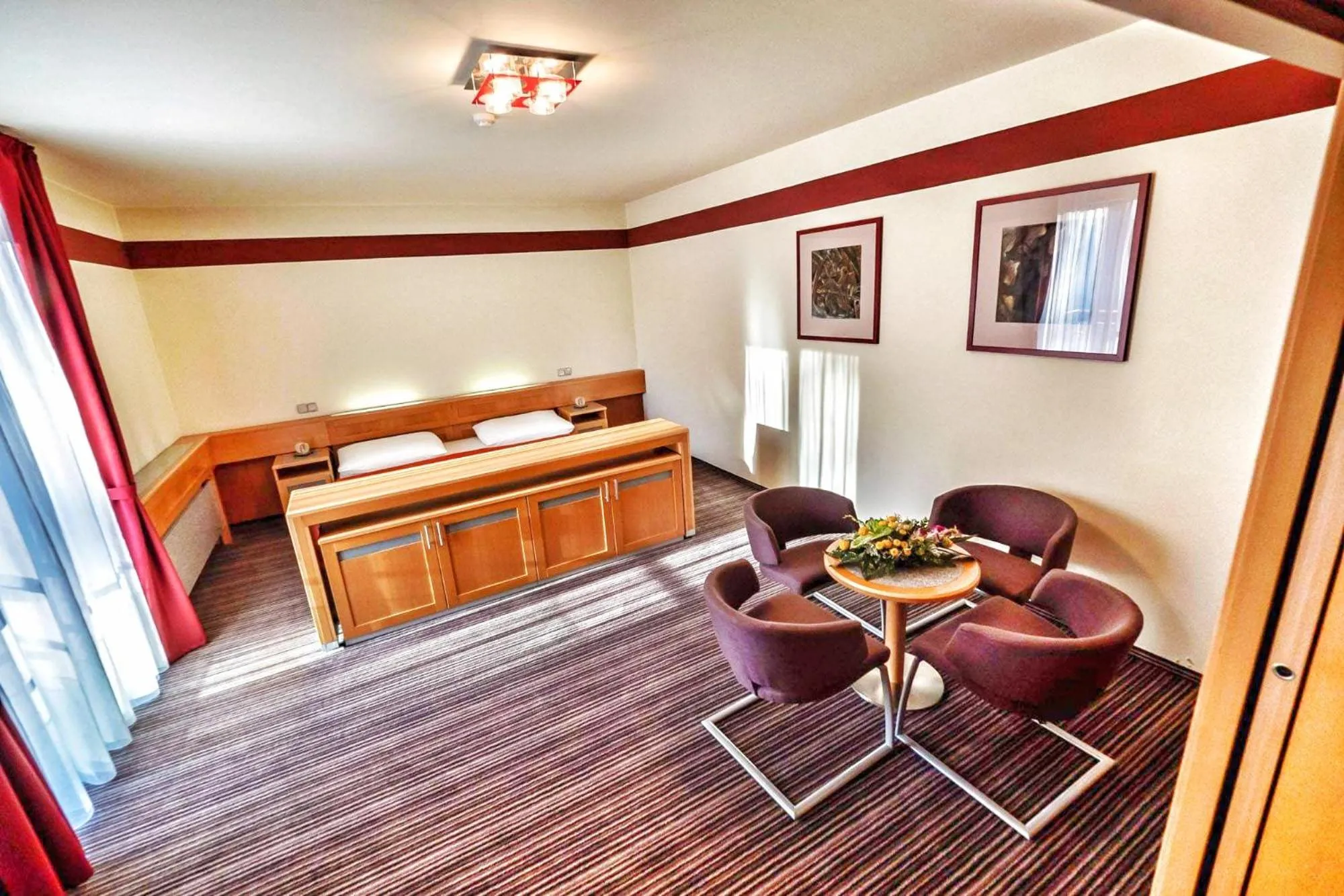 Dining area, Bed in Jan Maria Hotel