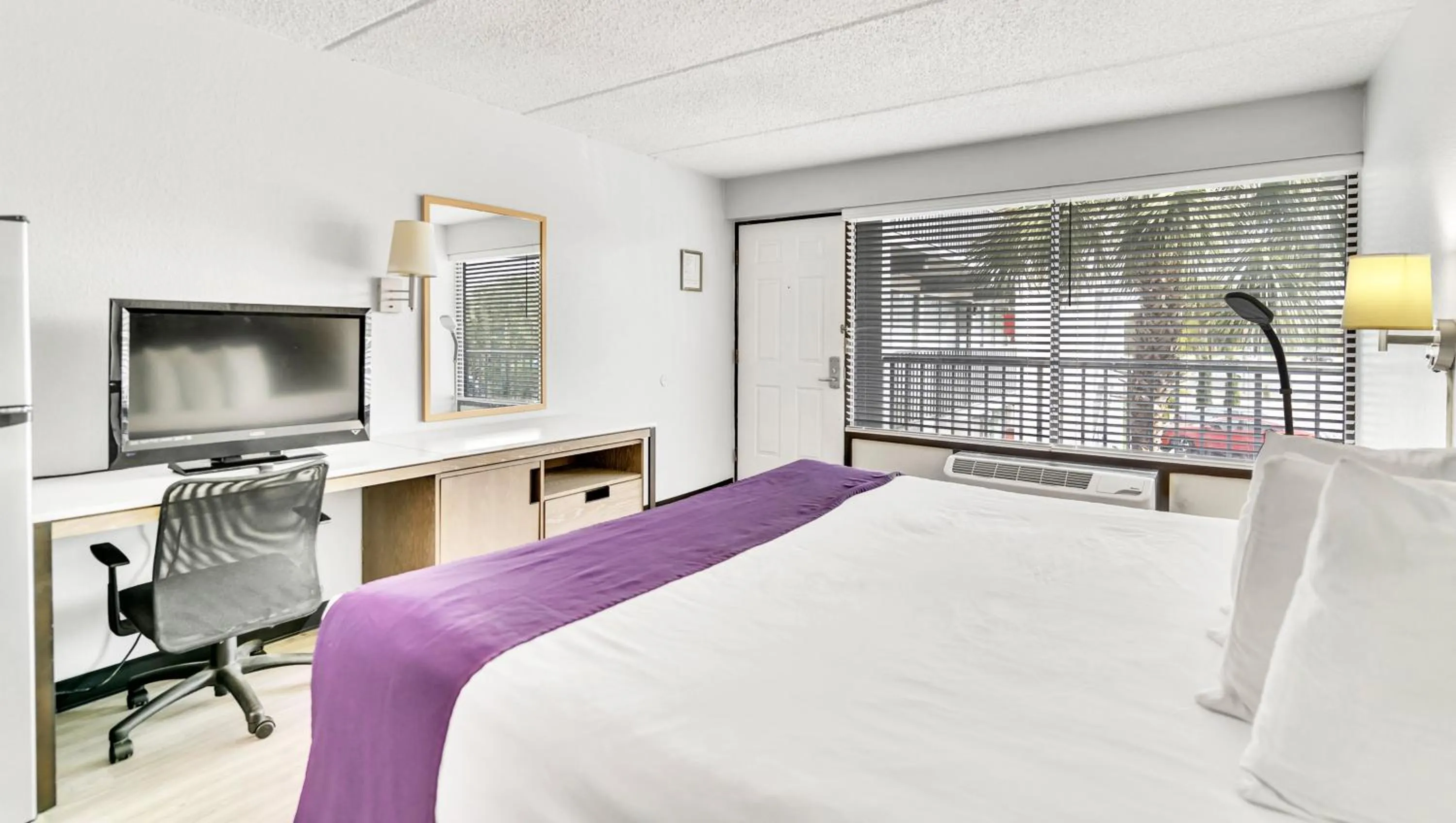 Bedroom, Bed in Home 1 Suites Extended Stay - Kissimmee