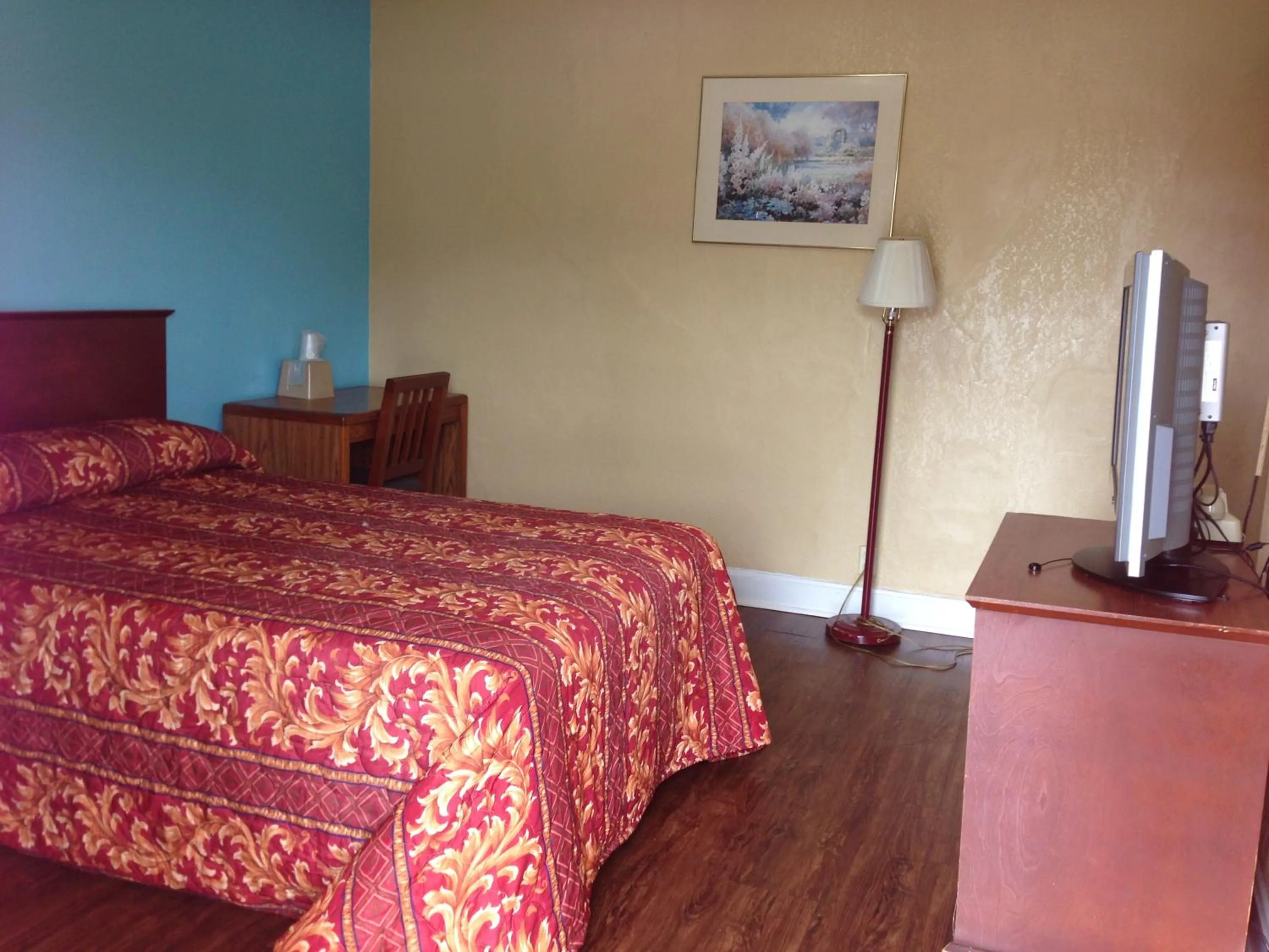 Bed in Ole English Inn