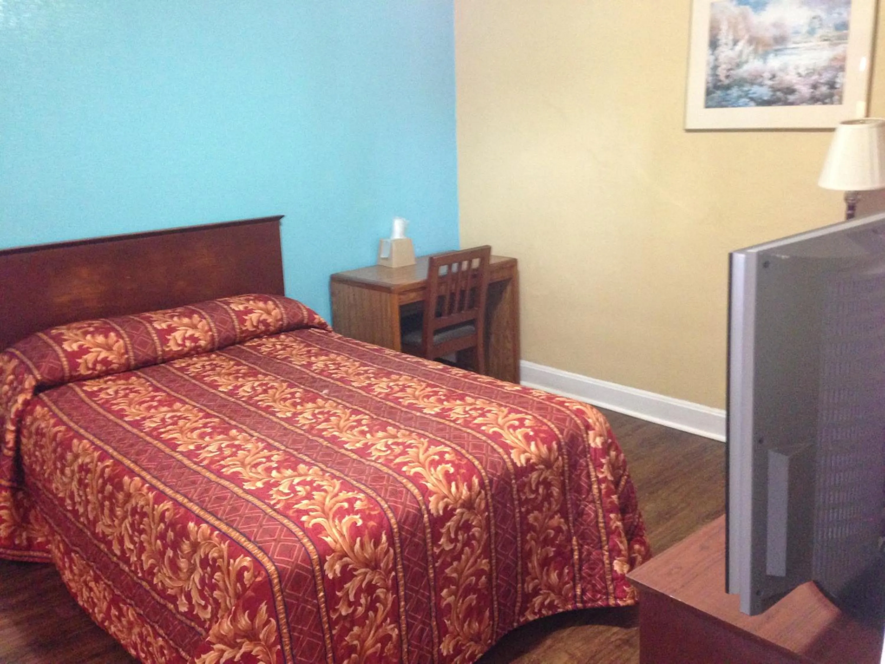 Bed in Ole English Inn