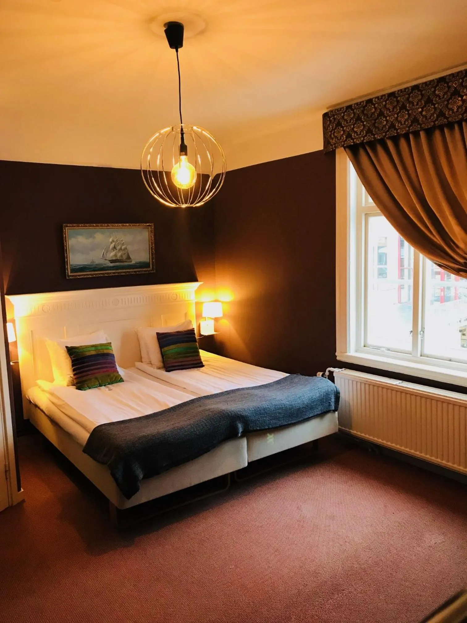 Photo of the whole room, Bed in Grenna Hotell