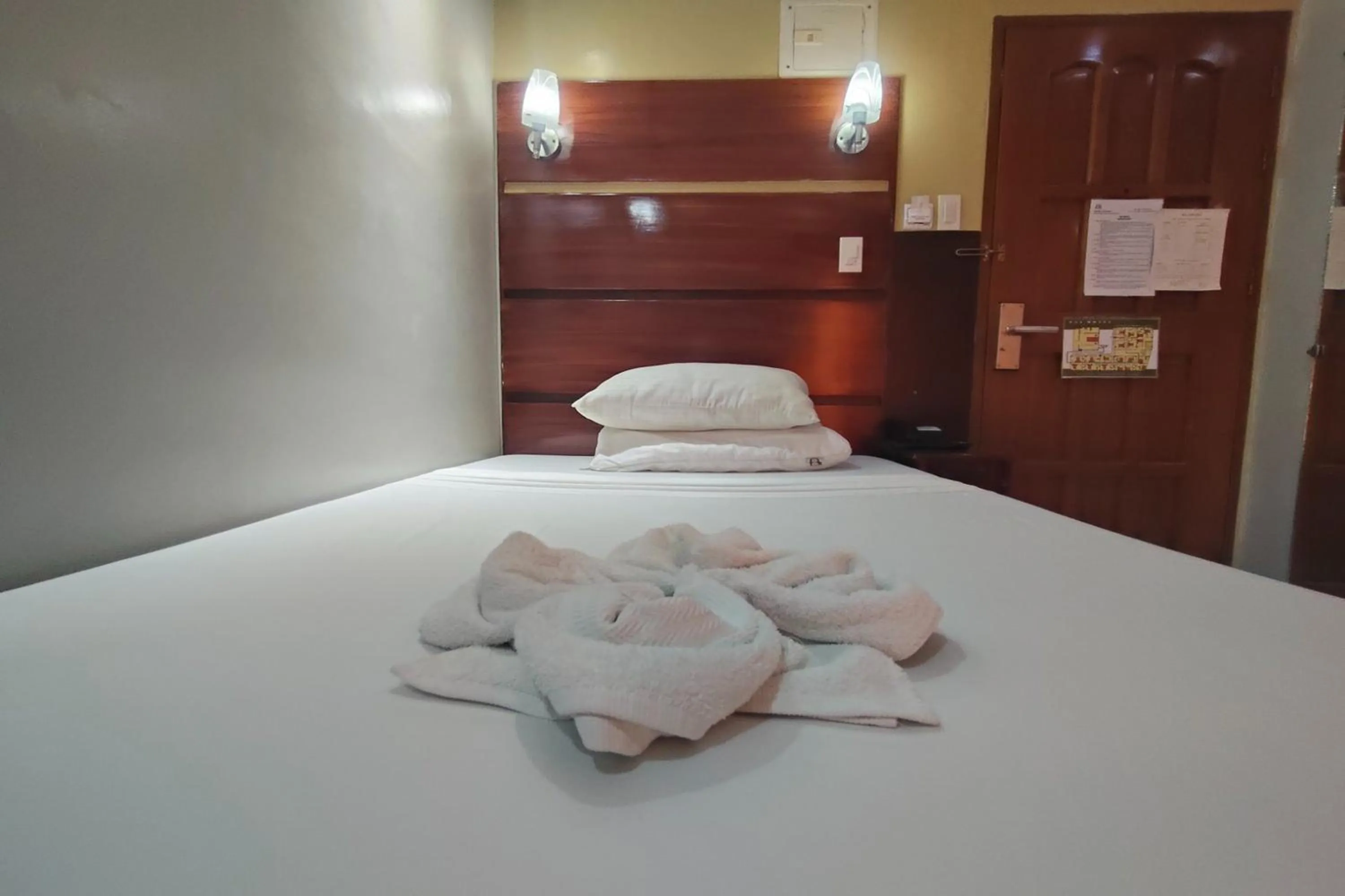 Photo of the whole room, Bed in Taj Hotel Tuguegarao