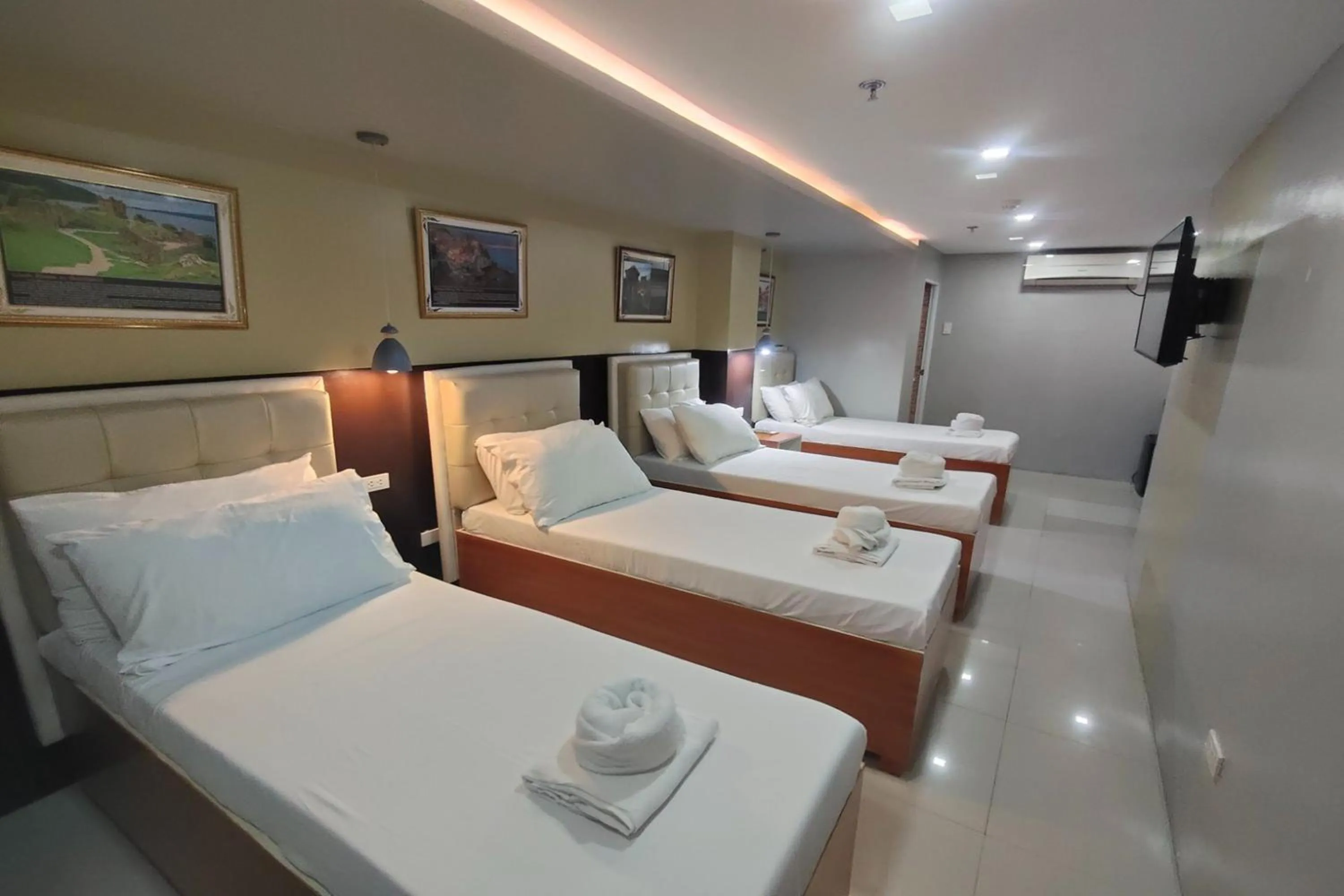 Photo of the whole room, Bed in Taj Hotel Tuguegarao