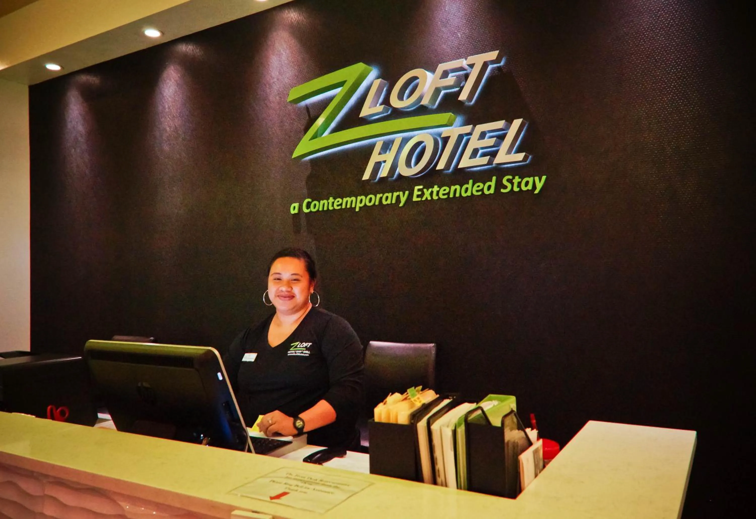 Staff in Z Loft Extended Stay Hotel