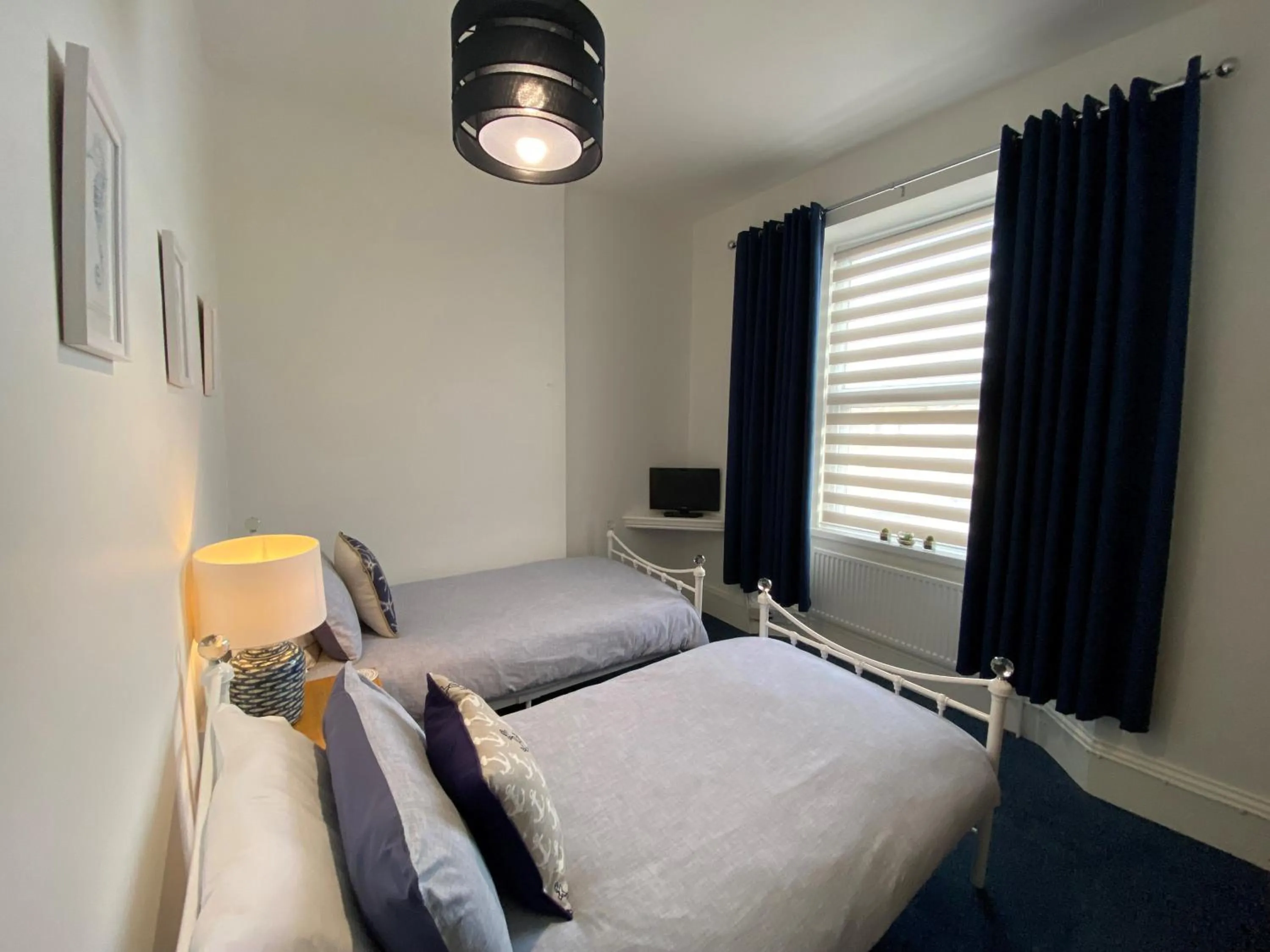 Bed in Rooms At Babbacombe