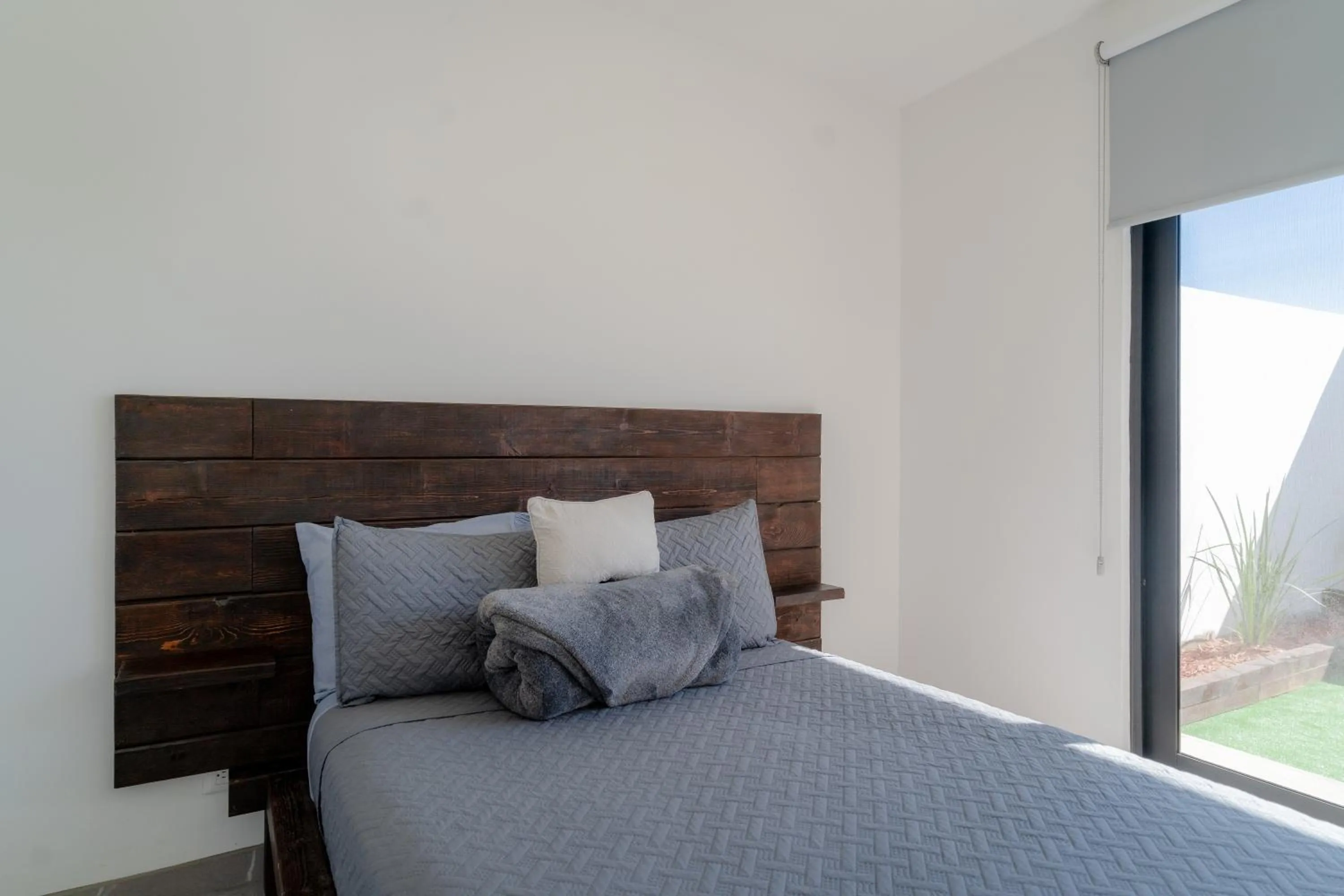 Bed in Collins Village Hotel Boutique