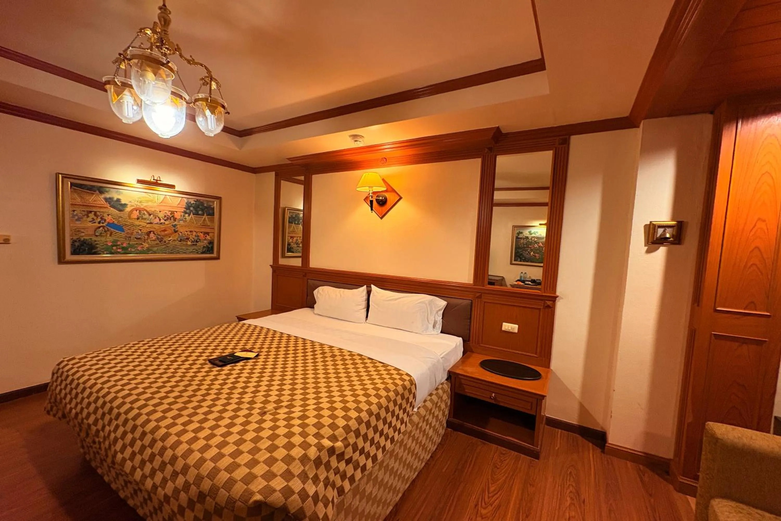 Bed in Taksila Hotel