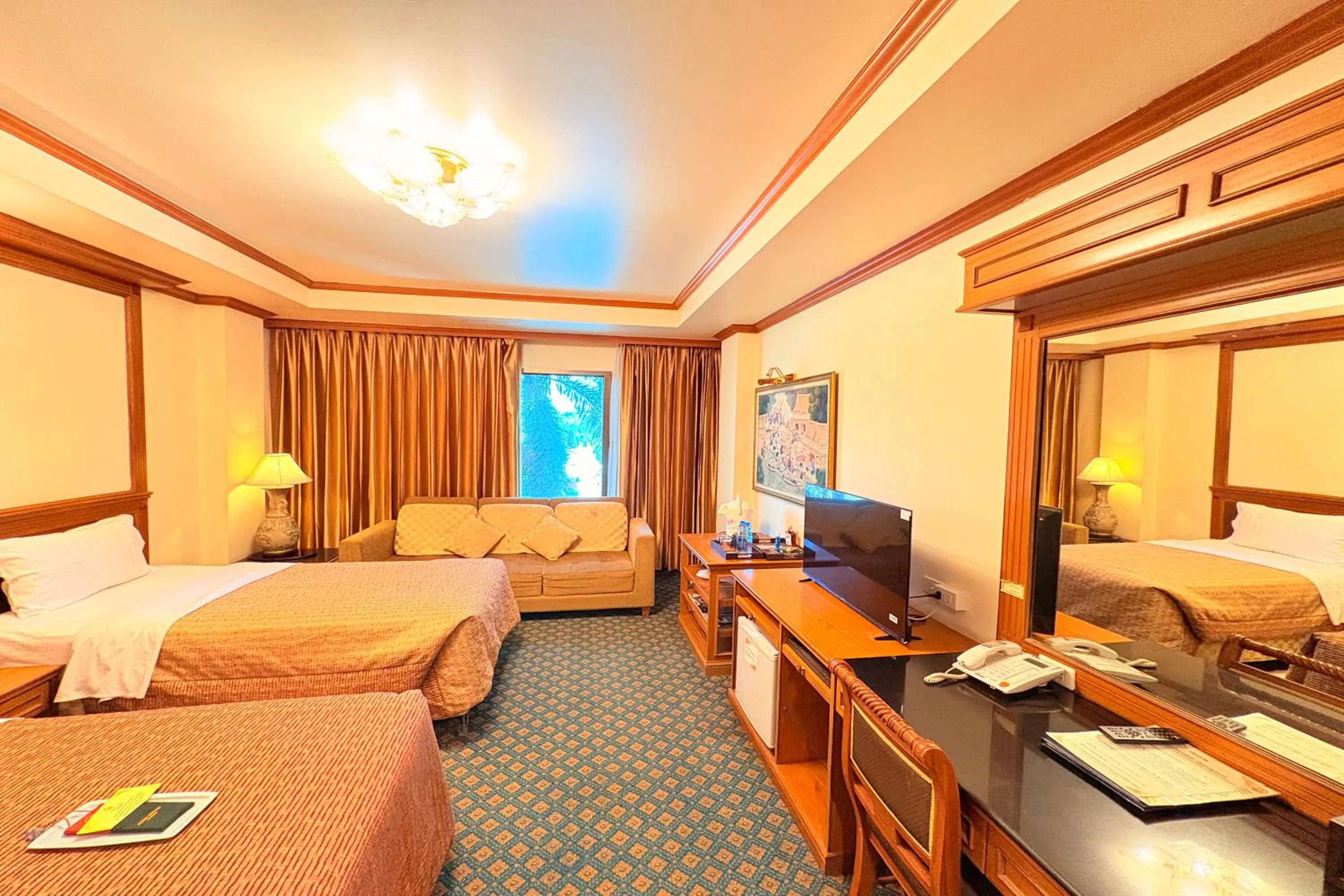 Bed in Taksila Hotel