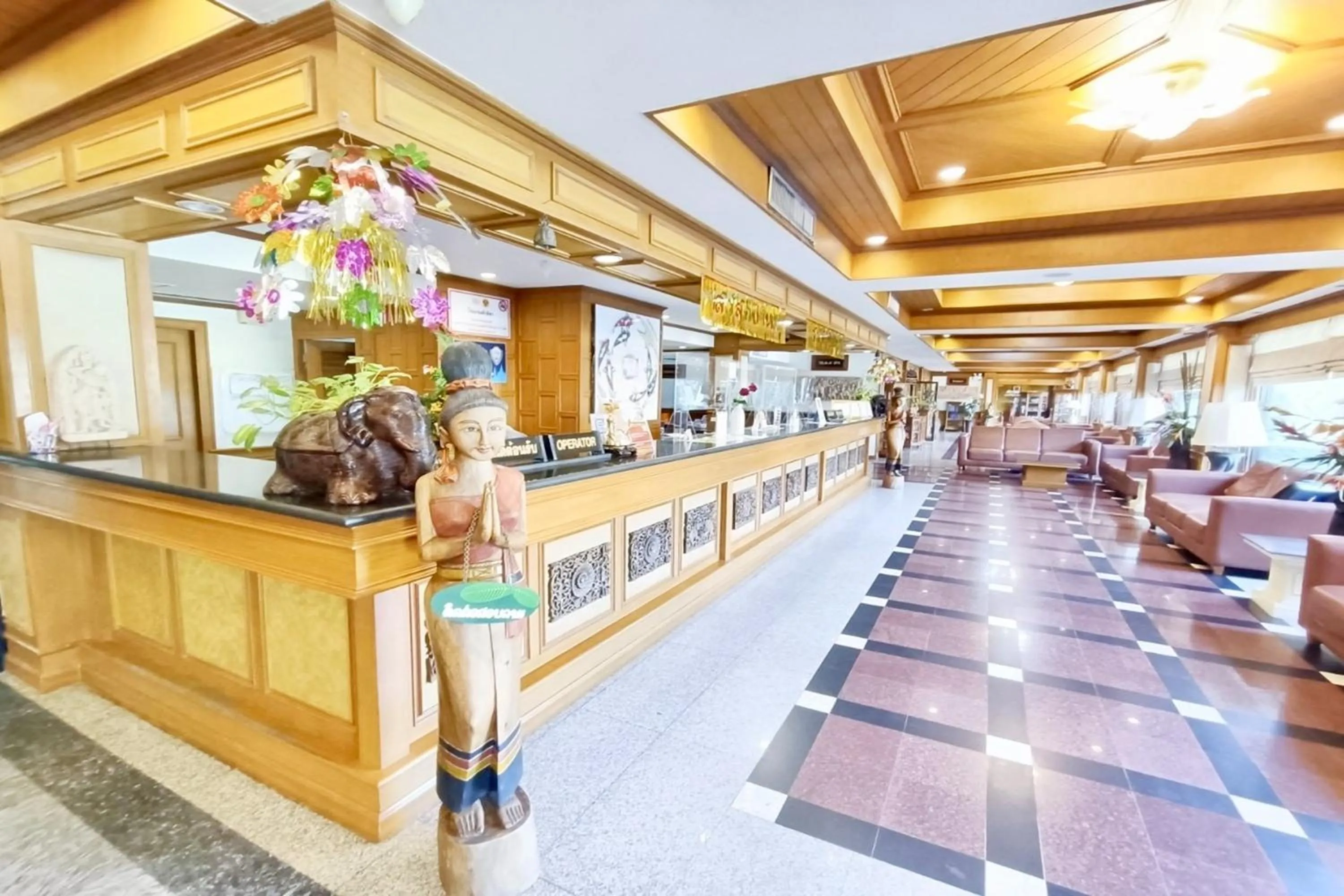 Lobby or reception in Taksila Hotel