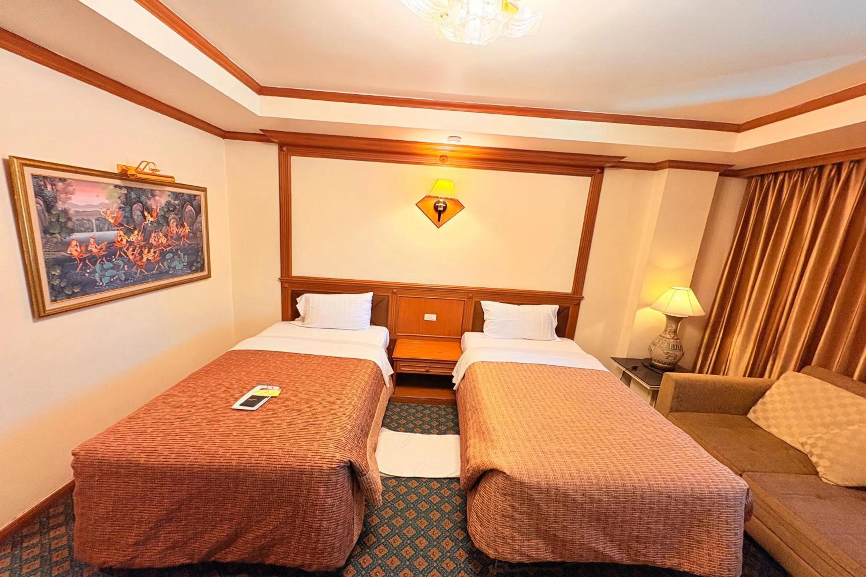 Bed in Taksila Hotel