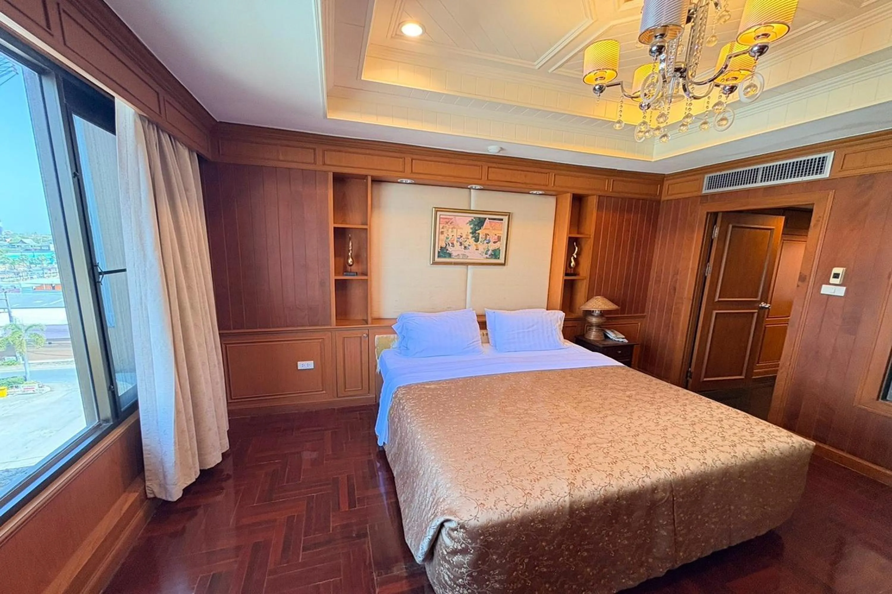 Bed in Taksila Hotel