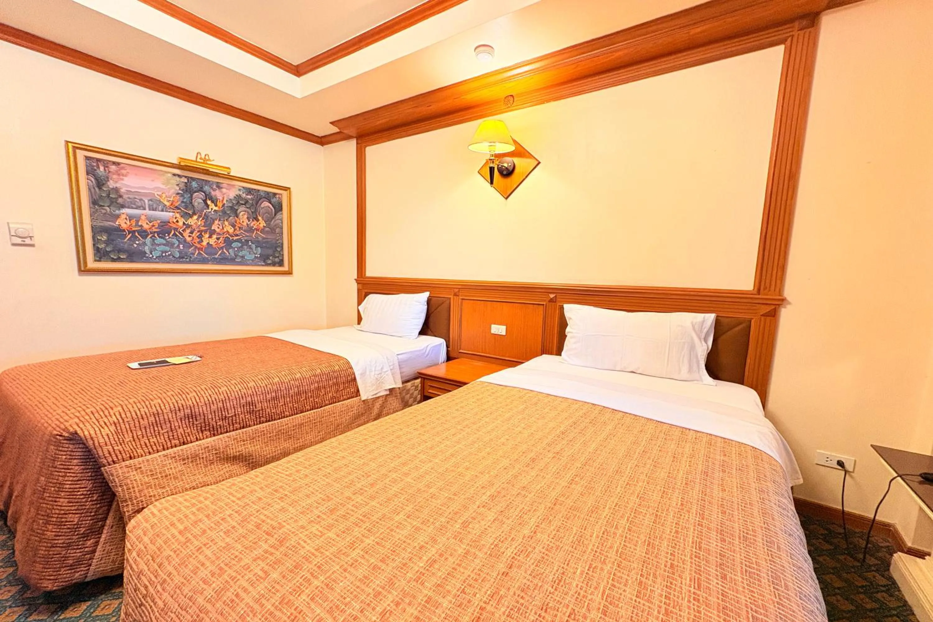 Bed in Taksila Hotel