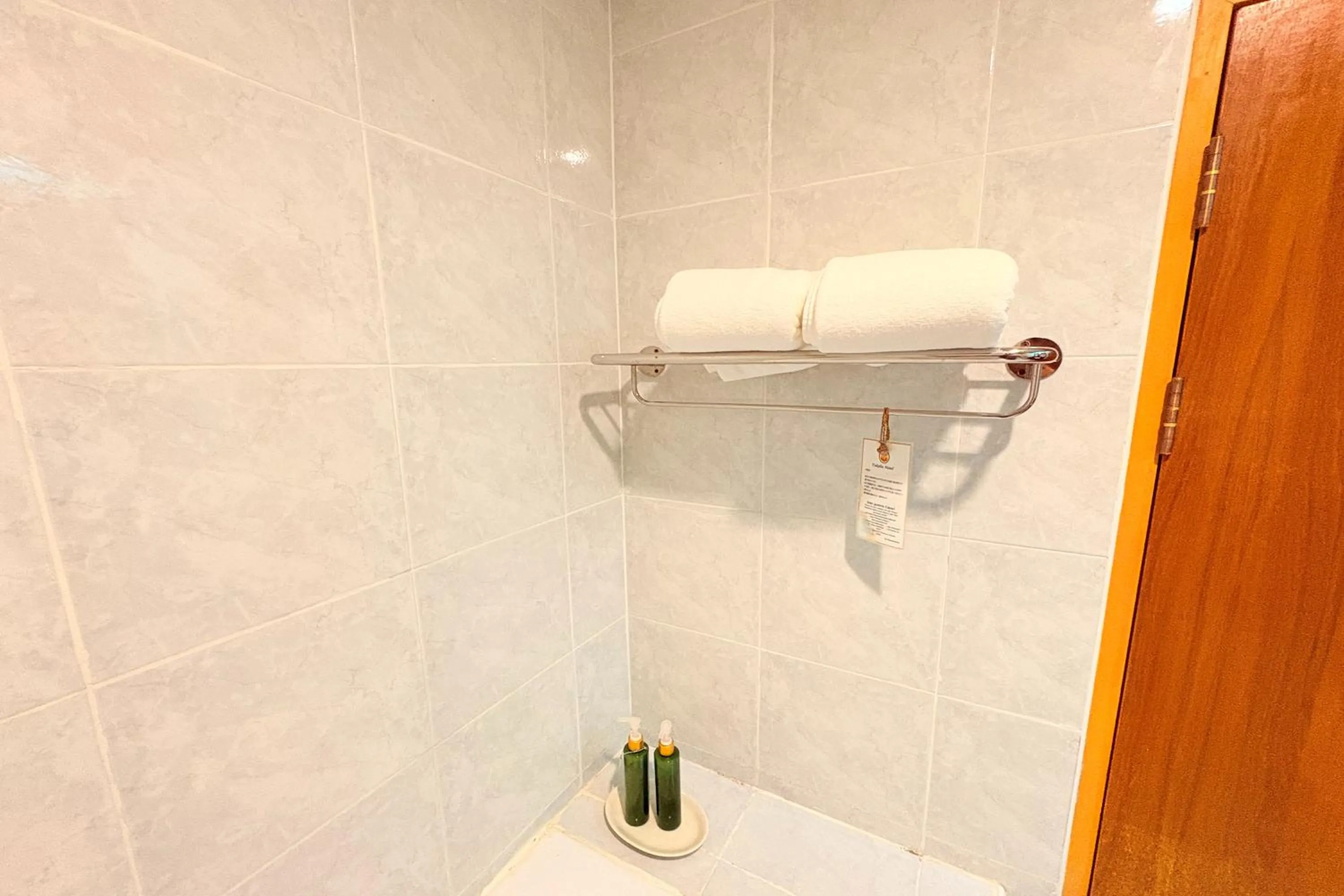 Bathroom in Taksila Hotel