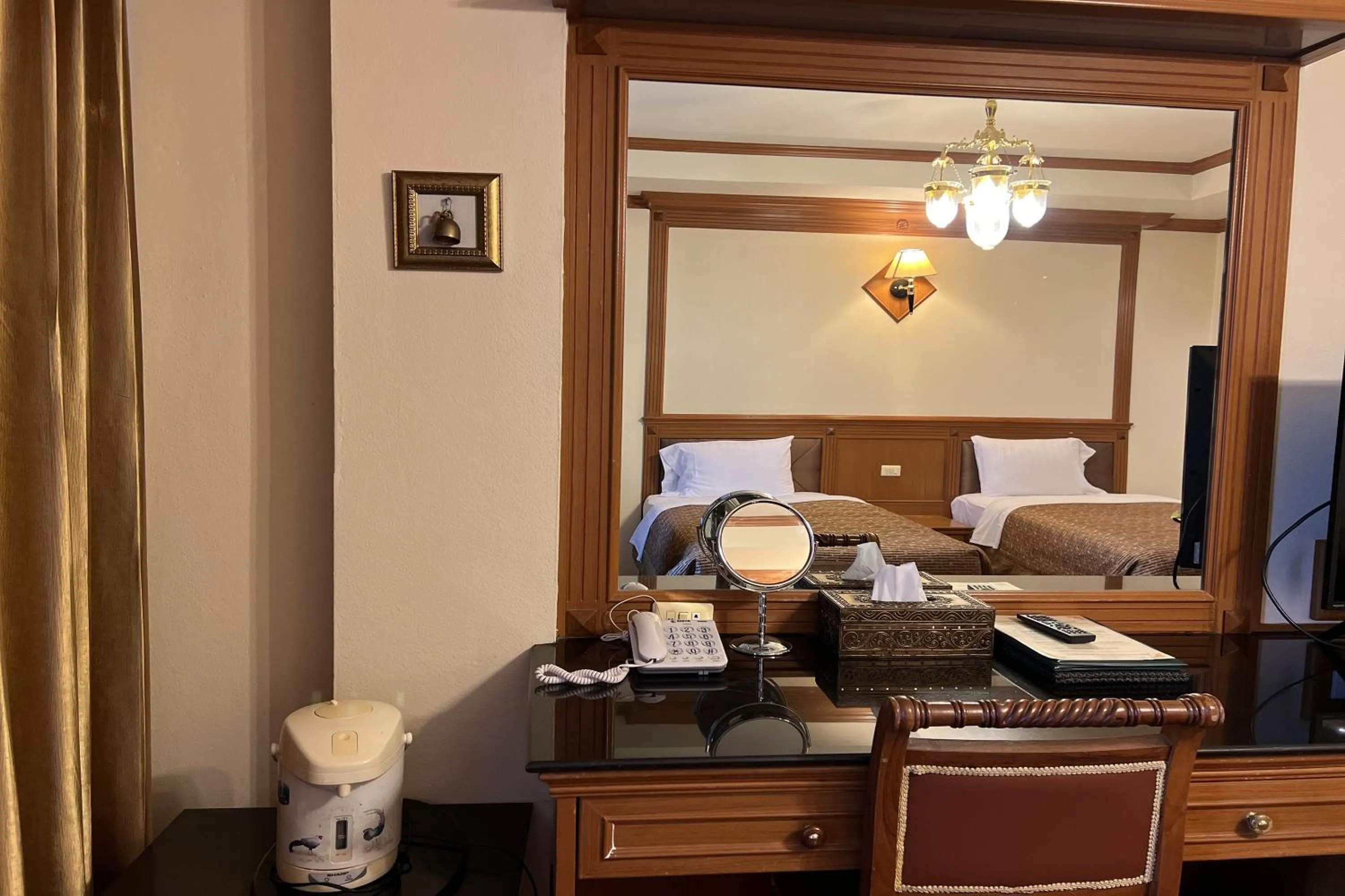 Bed in Taksila Hotel