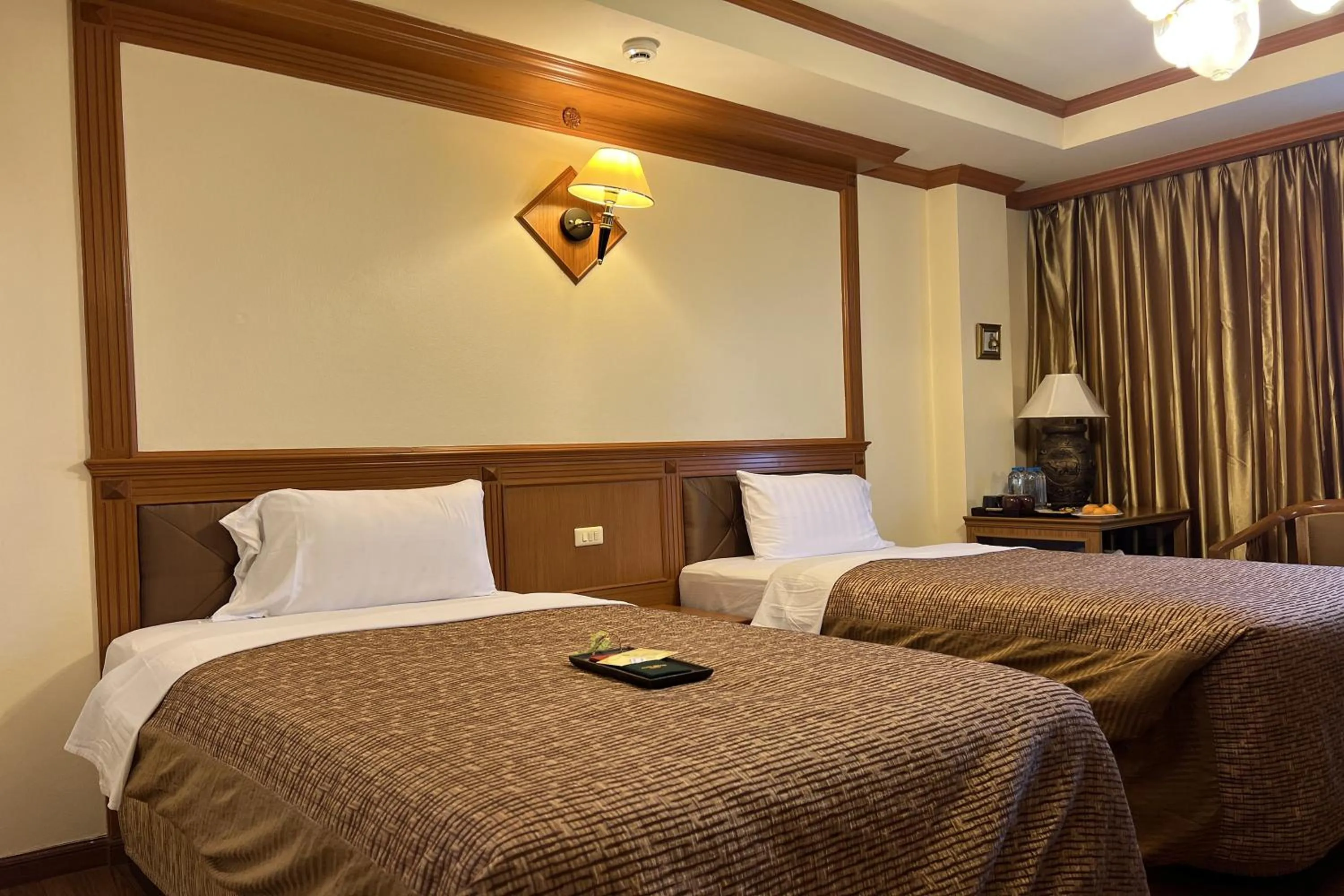 Bed in Taksila Hotel