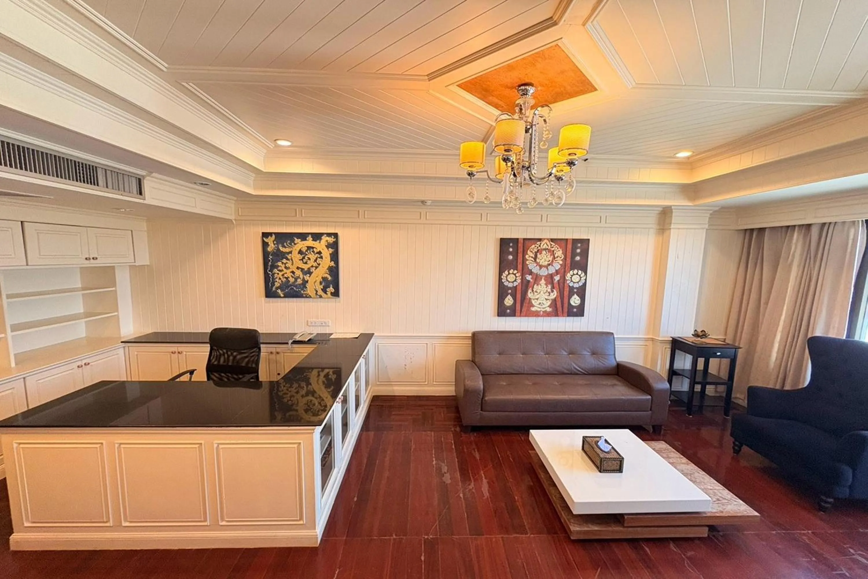 Living room in Taksila Hotel