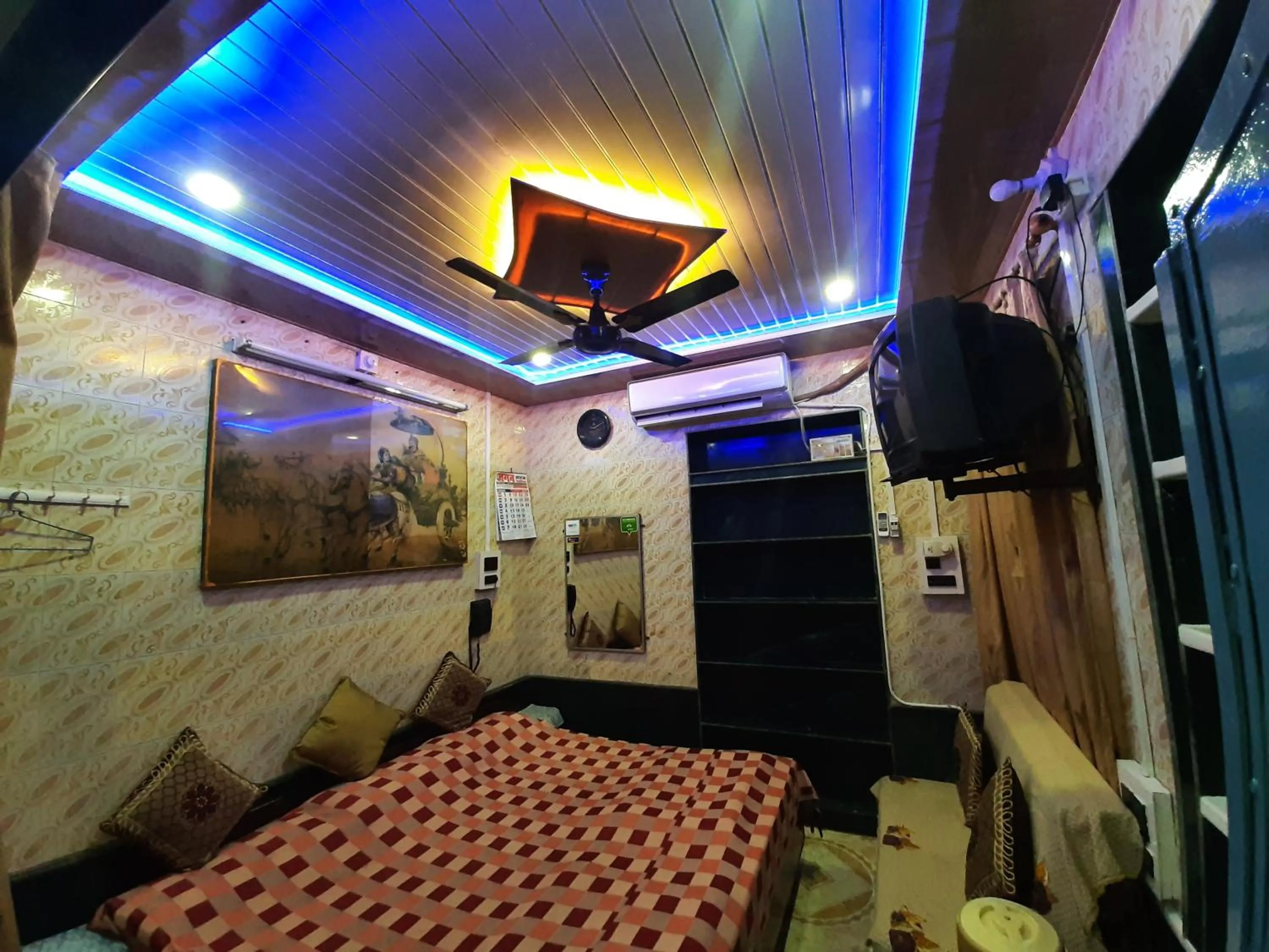 Photo of the whole room, Bed in Jagan Hotel & Restaurant