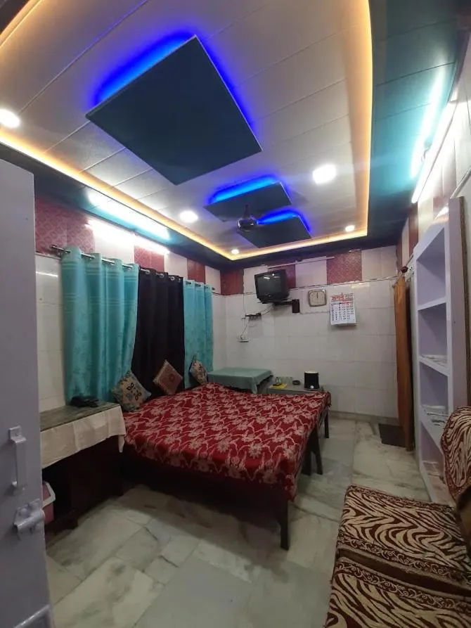 Photo of the whole room, Bed in Jagan Hotel & Restaurant