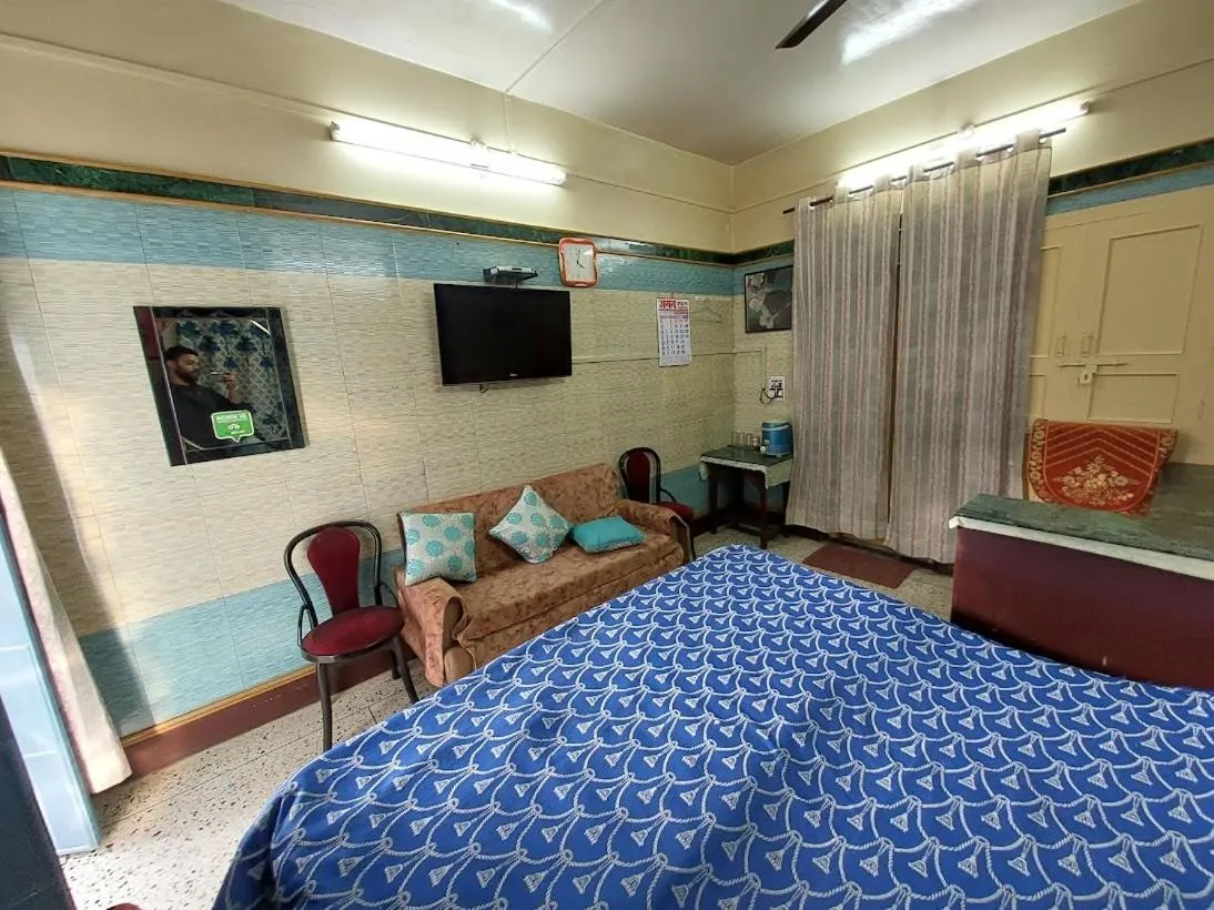Photo of the whole room, Bed in Jagan Hotel & Restaurant