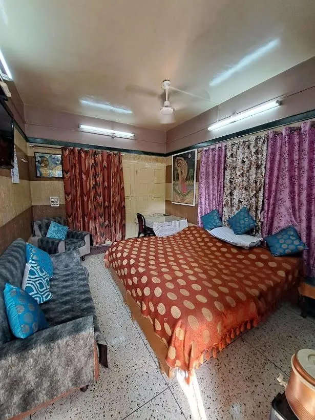 Photo of the whole room, Bed in Jagan Hotel & Restaurant
