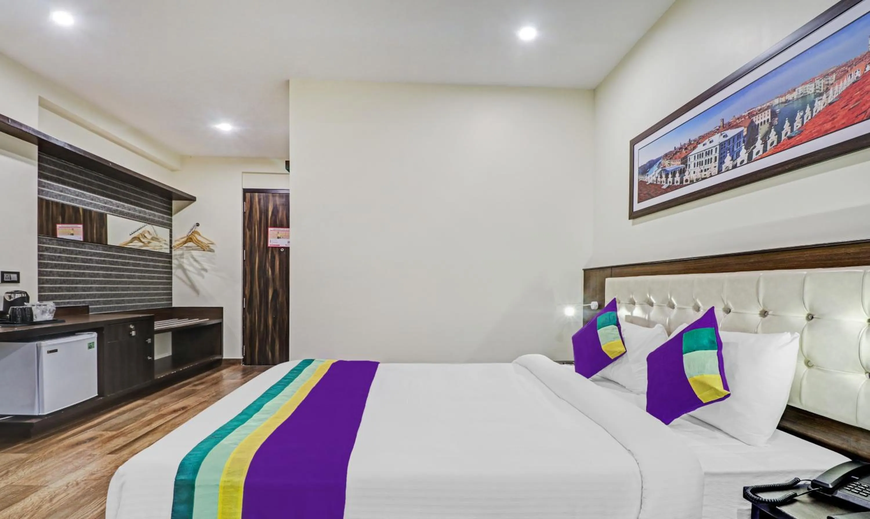 Bedroom, Bed in Treebo Premium Raj Vista Global Village