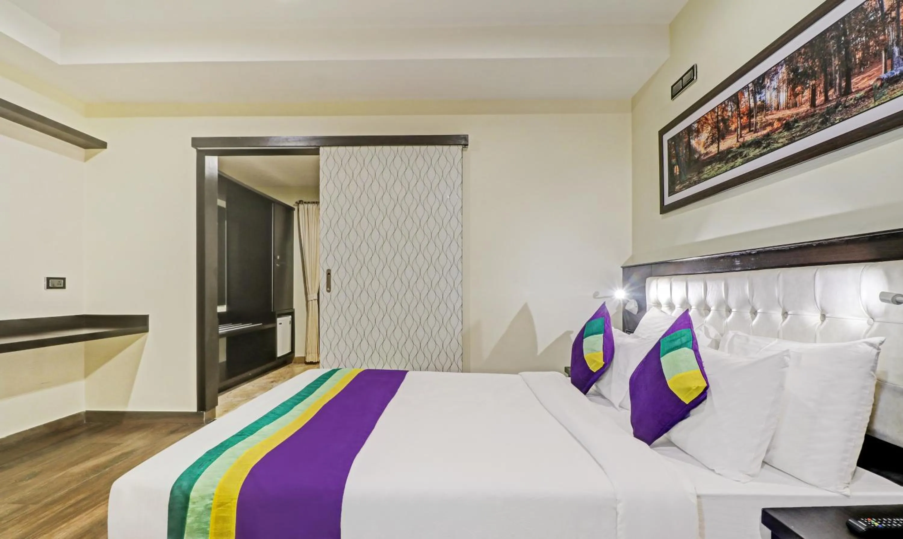 Bedroom, Bed in Treebo Premium Raj Vista Global Village