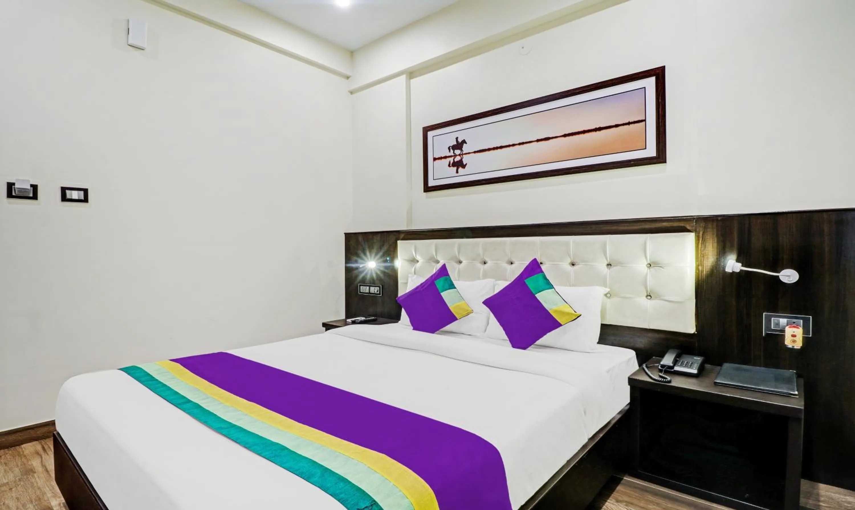 Bedroom, Bed in Treebo Premium Raj Vista Global Village