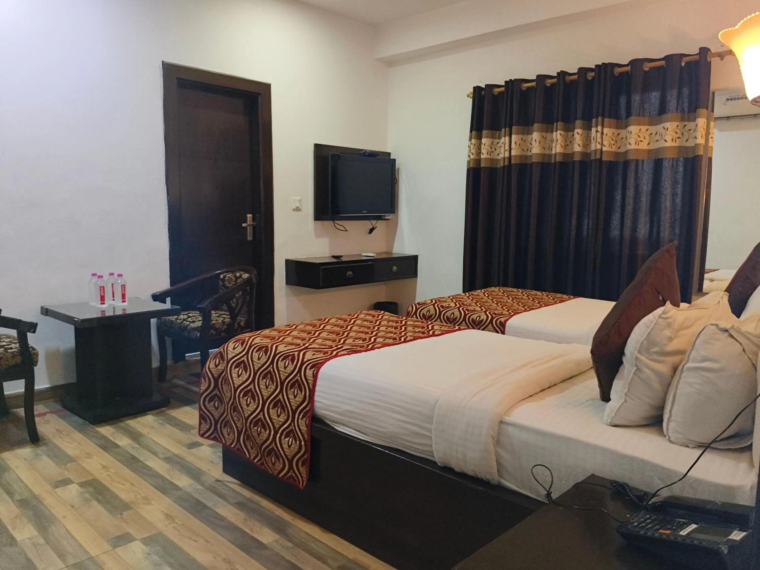 Bed in Hotel Samovar by Goyal Hoteleirs